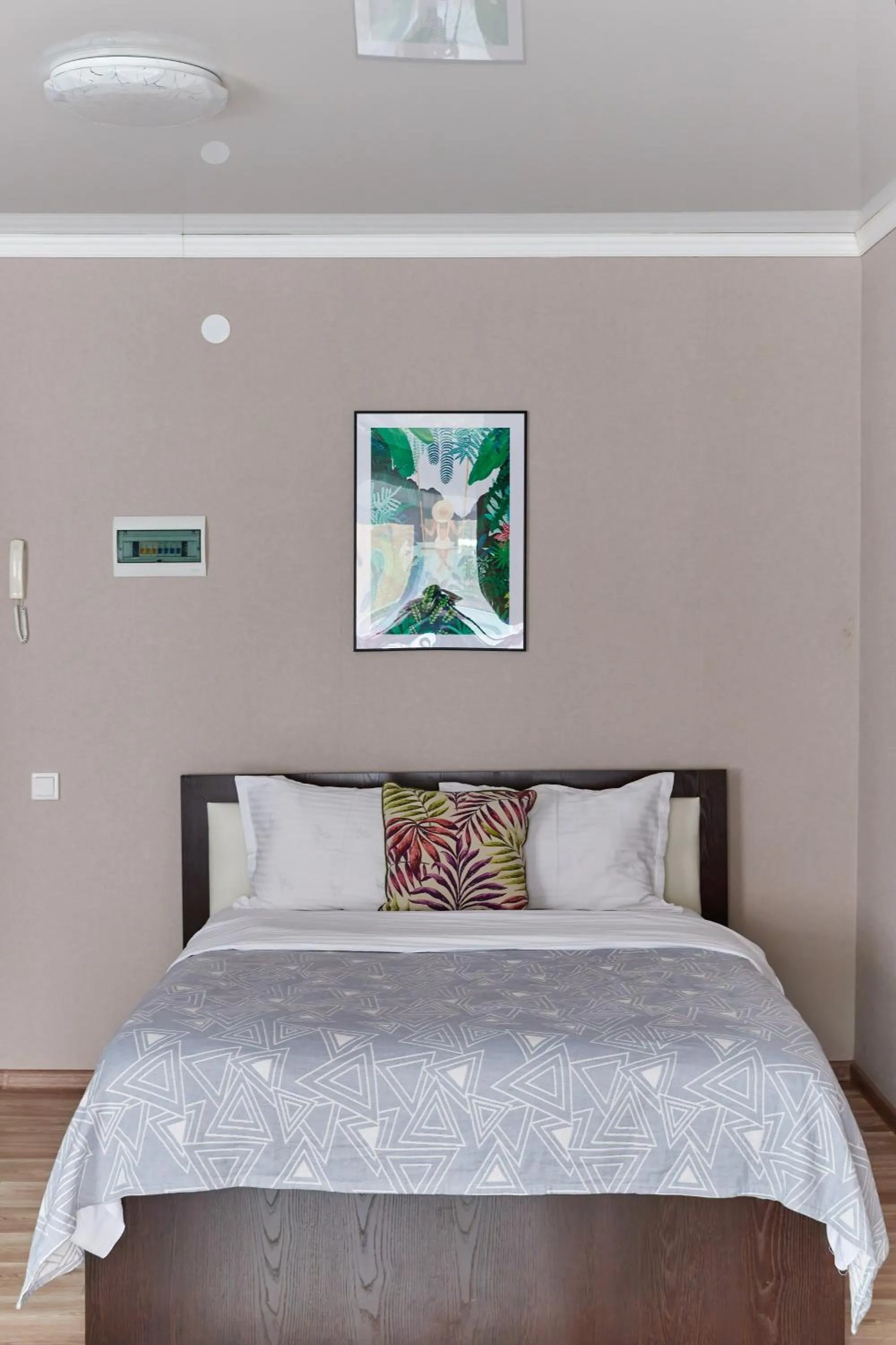 Bed in Seven City Apartments