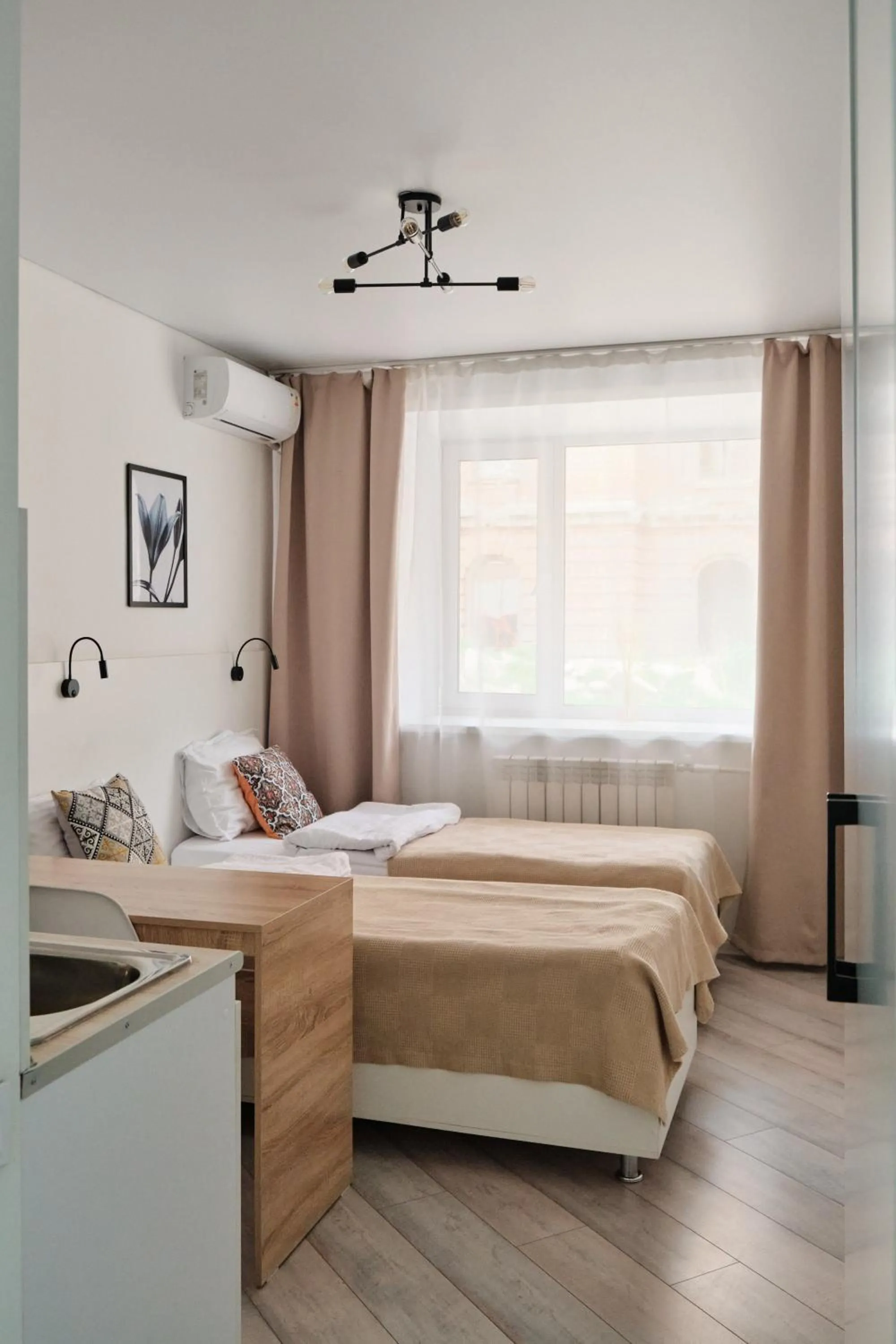 Bed in Seven City Apartments