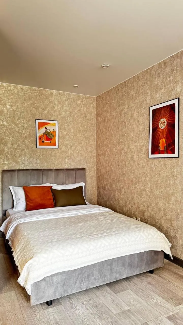 Bed in Seven City Apartments