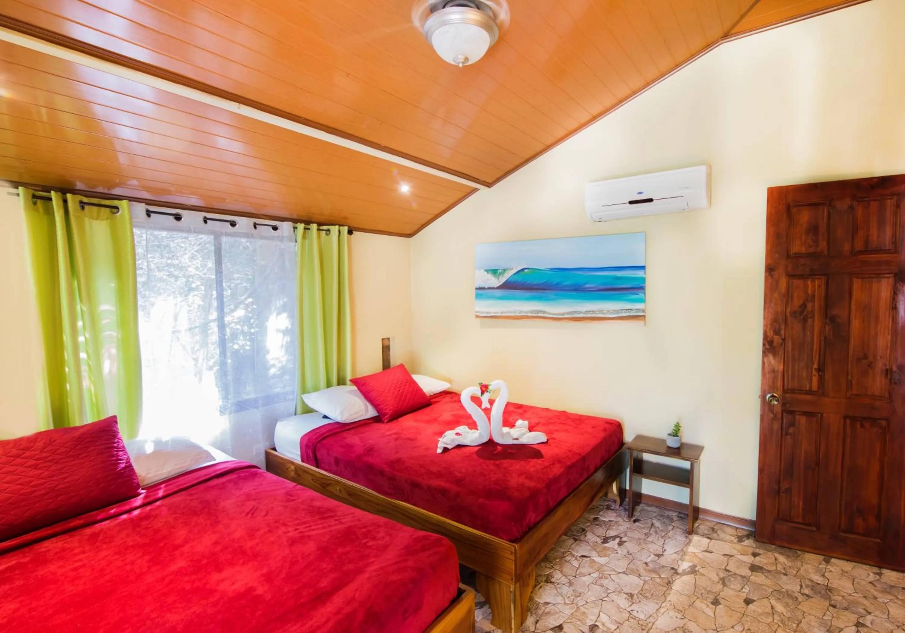 Bed in Jungle Beach Hotel Manuel Antonio