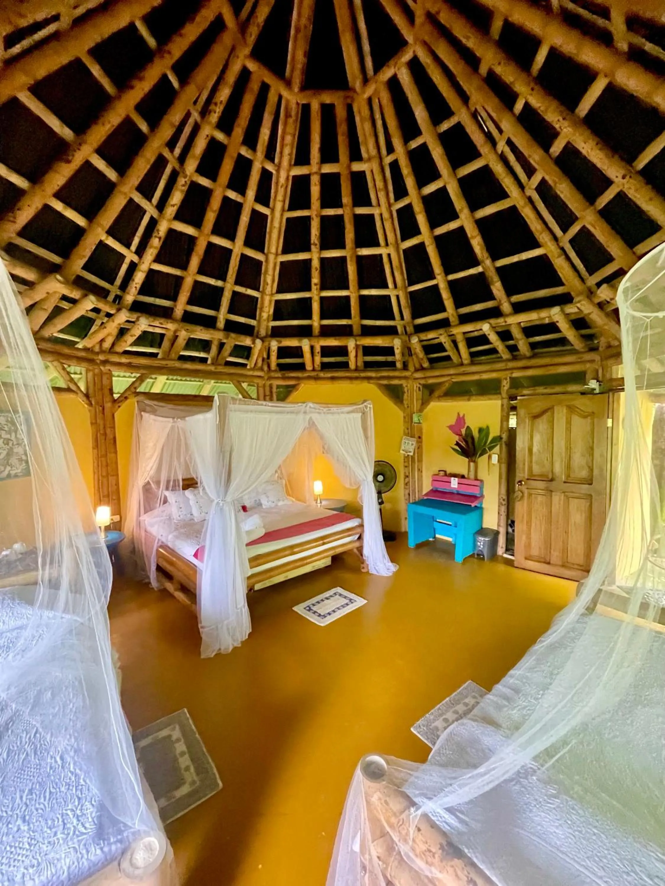 Photo of the whole room, Bed in Minca Ecohabs Hotel