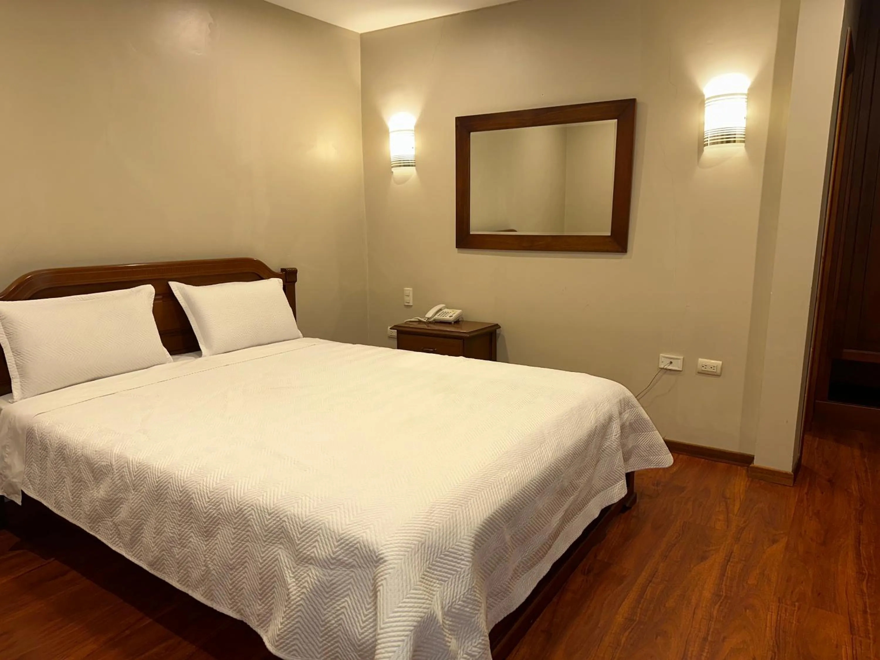 Bed in Hotel & Suites El Quijote