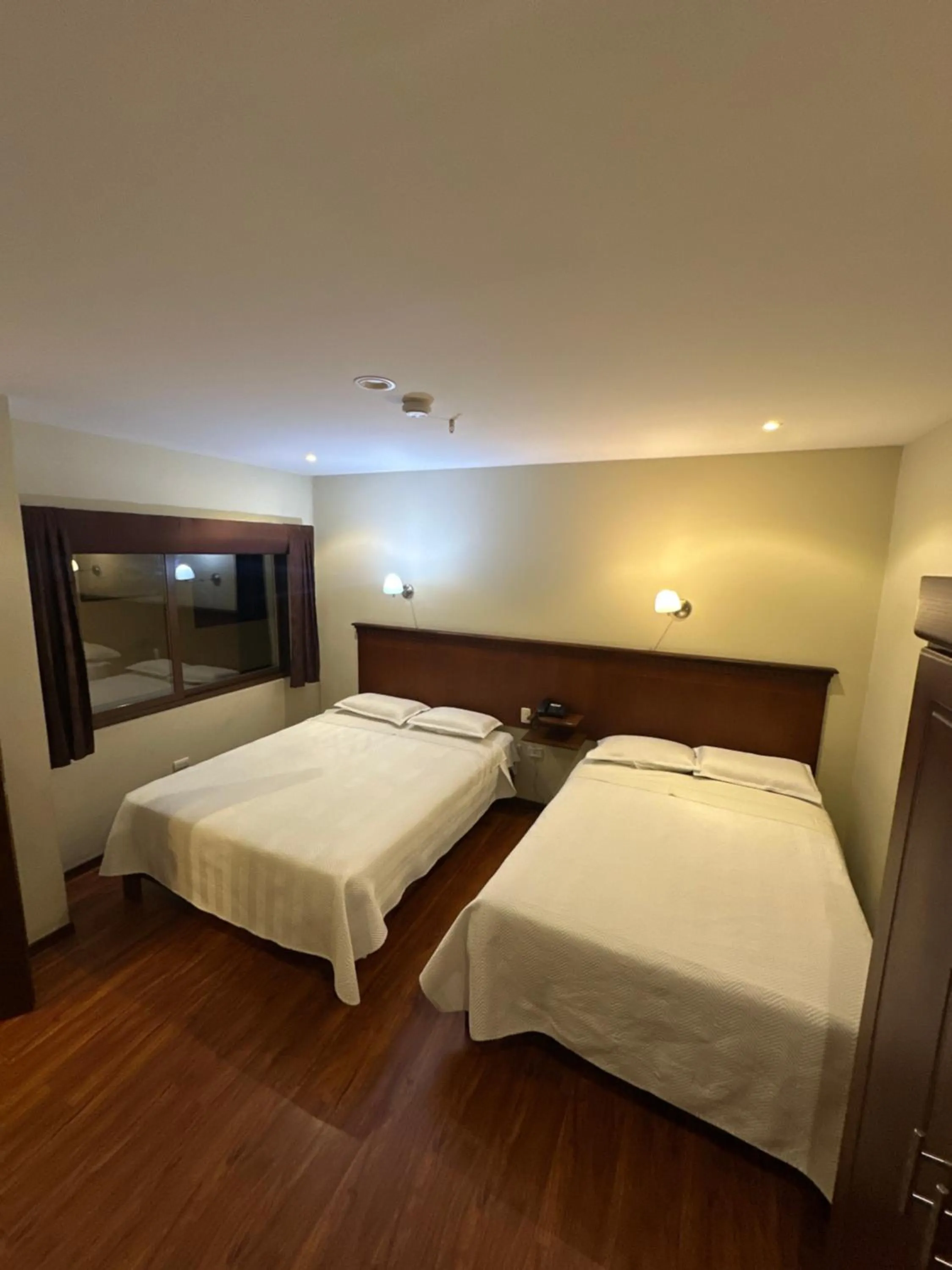 Bed in Hotel & Suites El Quijote