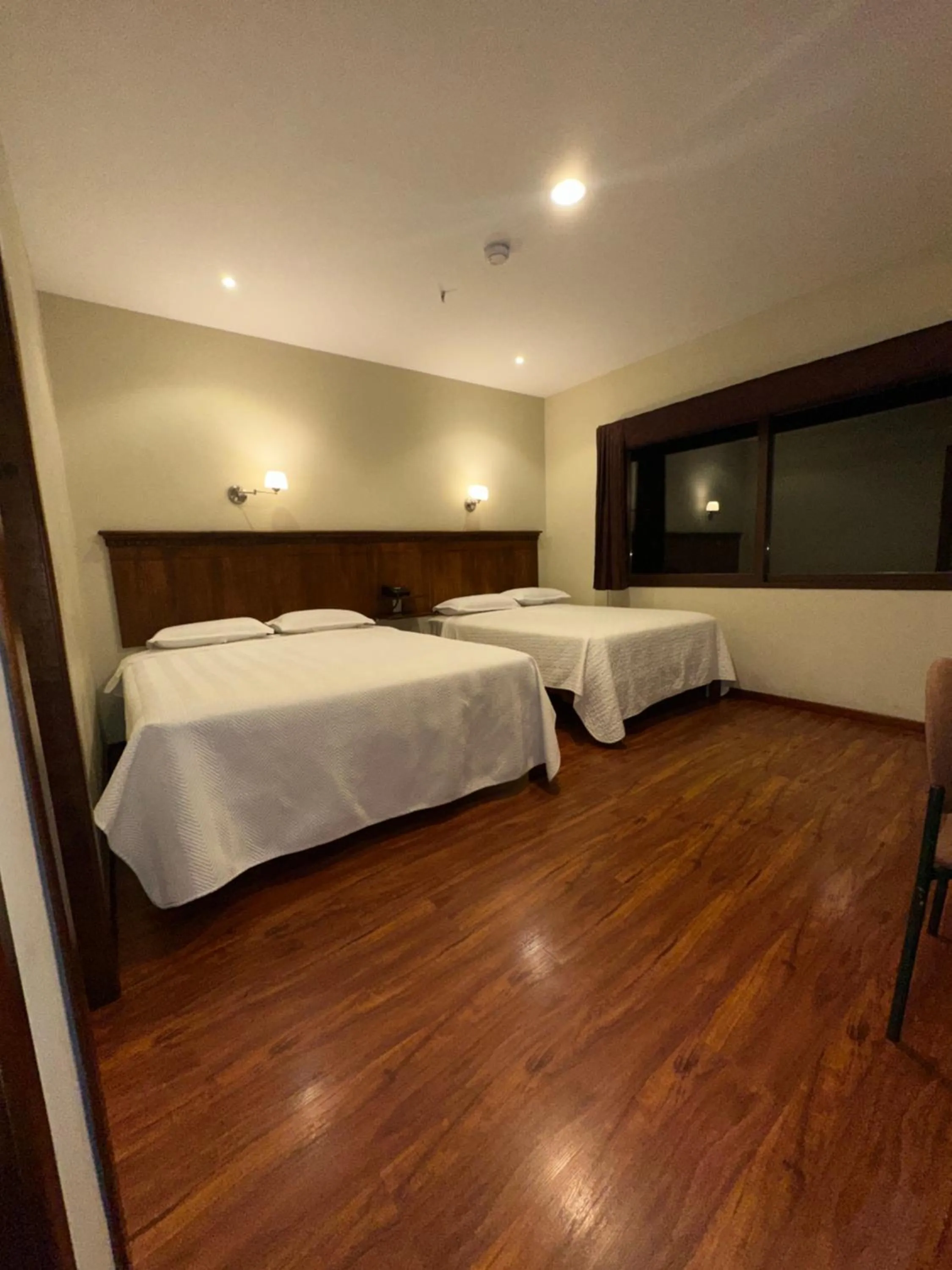 Bed in Hotel & Suites El Quijote