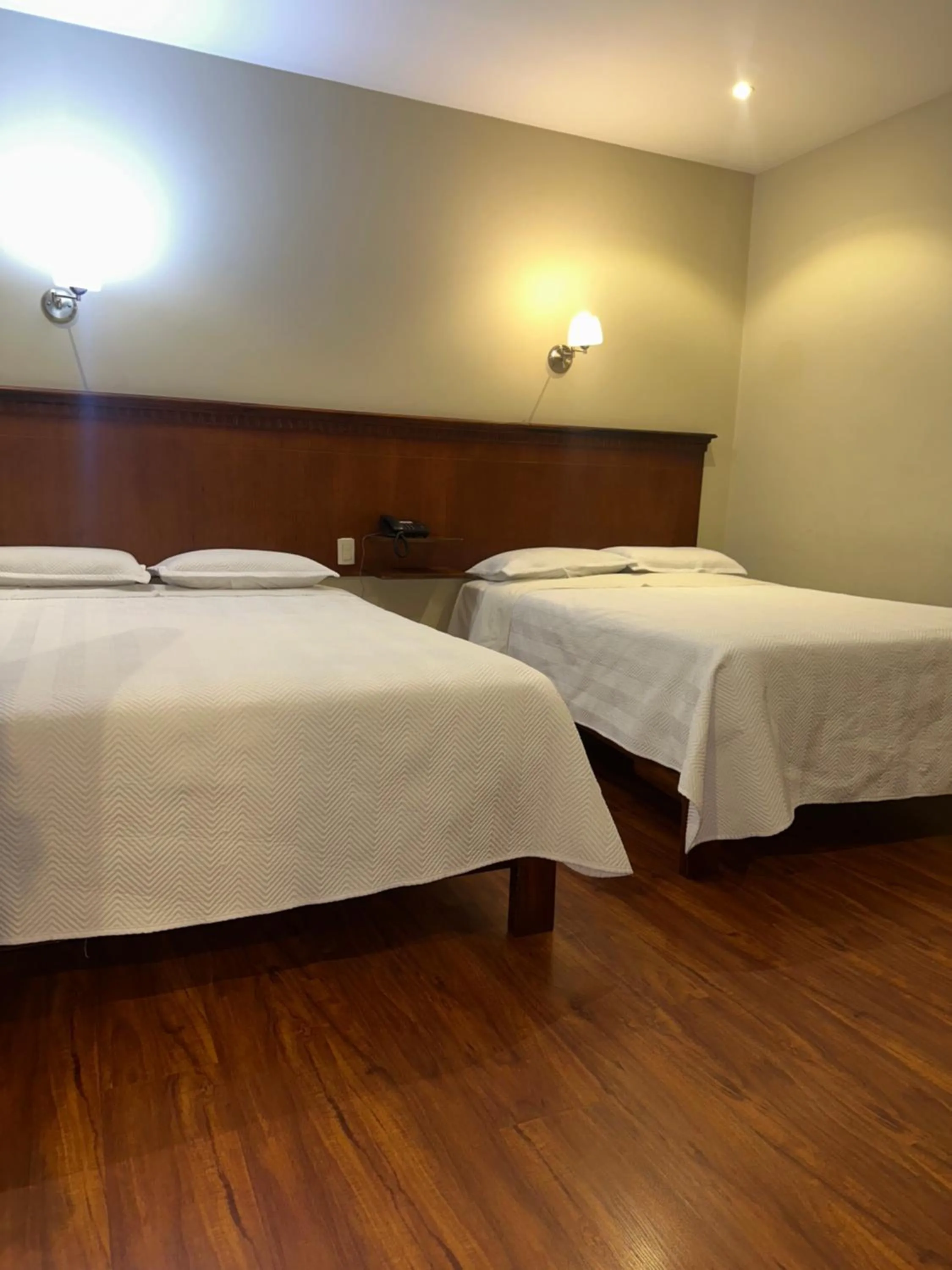 Bed in Hotel & Suites El Quijote