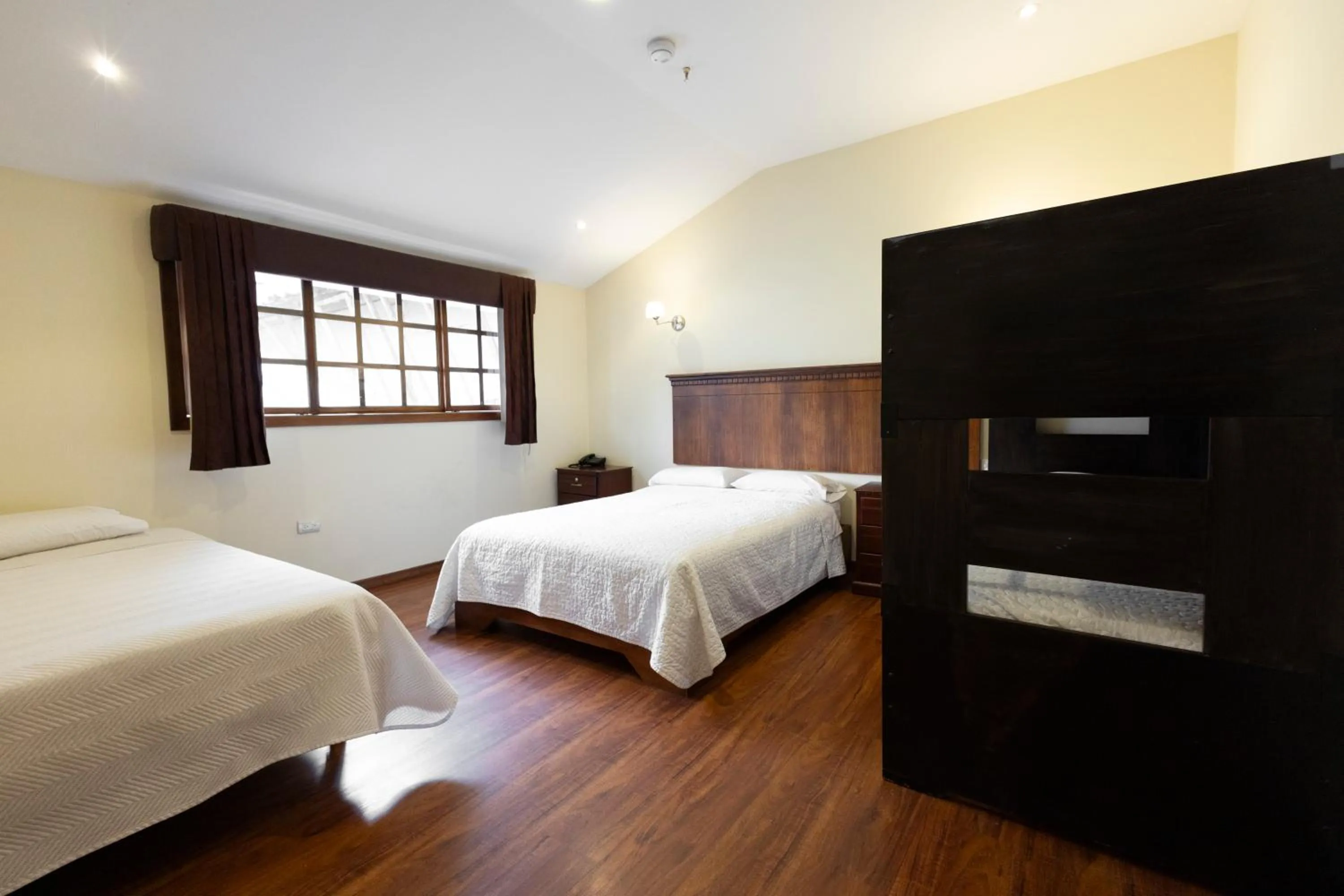 Bed in Hotel & Suites El Quijote