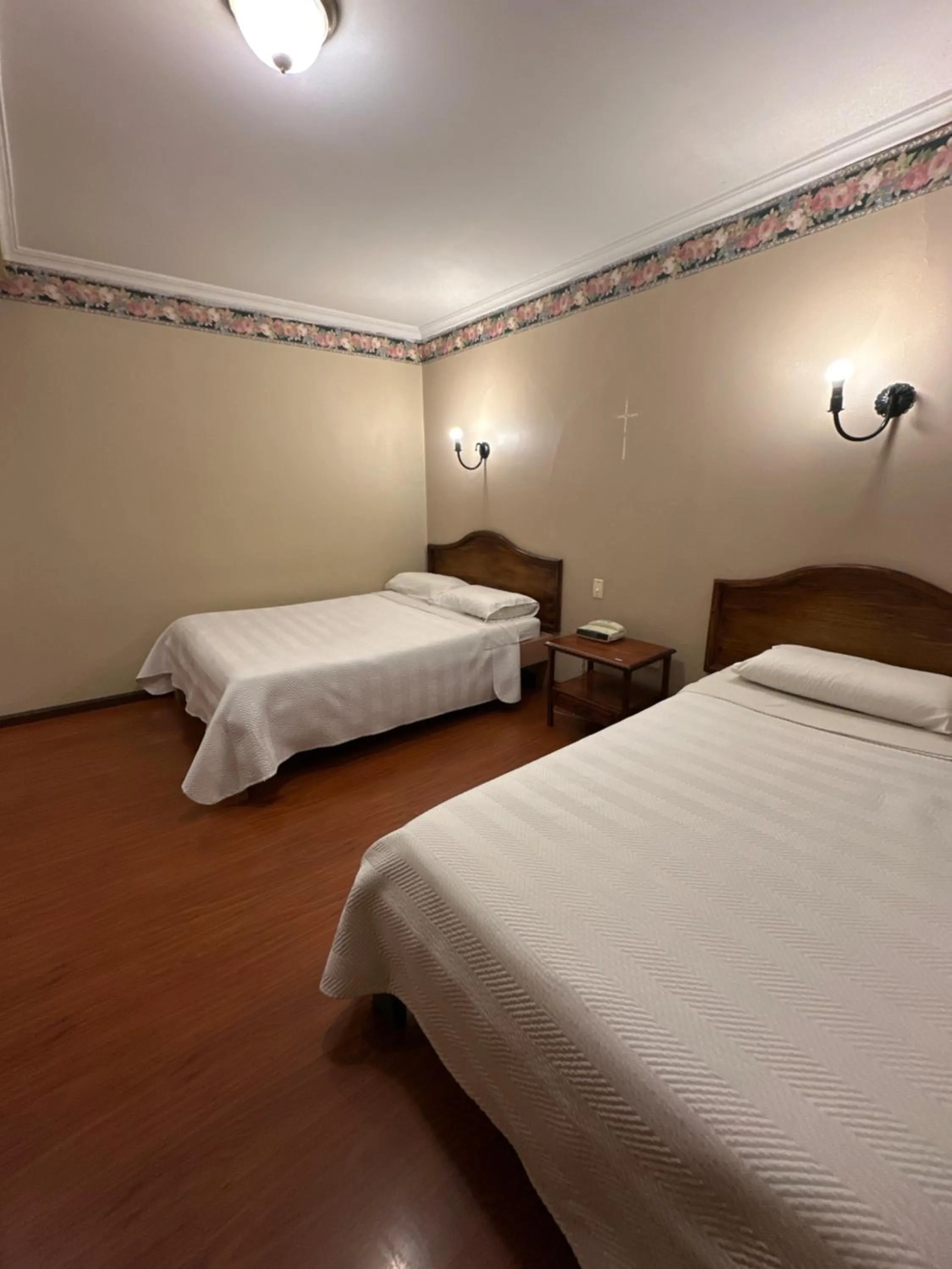 Bed in Hotel & Suites El Quijote