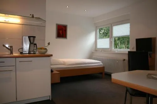 Photo of the whole room, Bed in Apartment-Haus