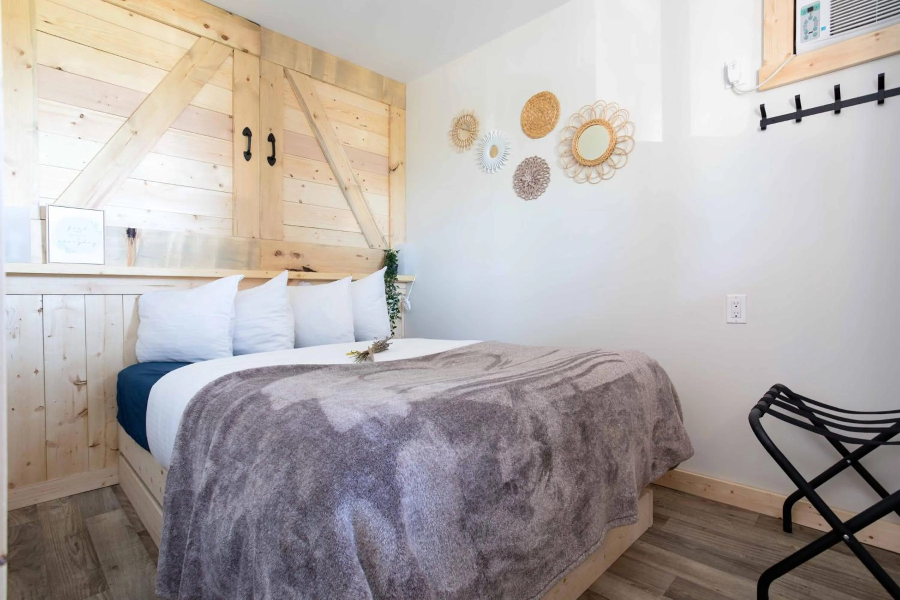 Bed in The Valley View Cabins and Event Center