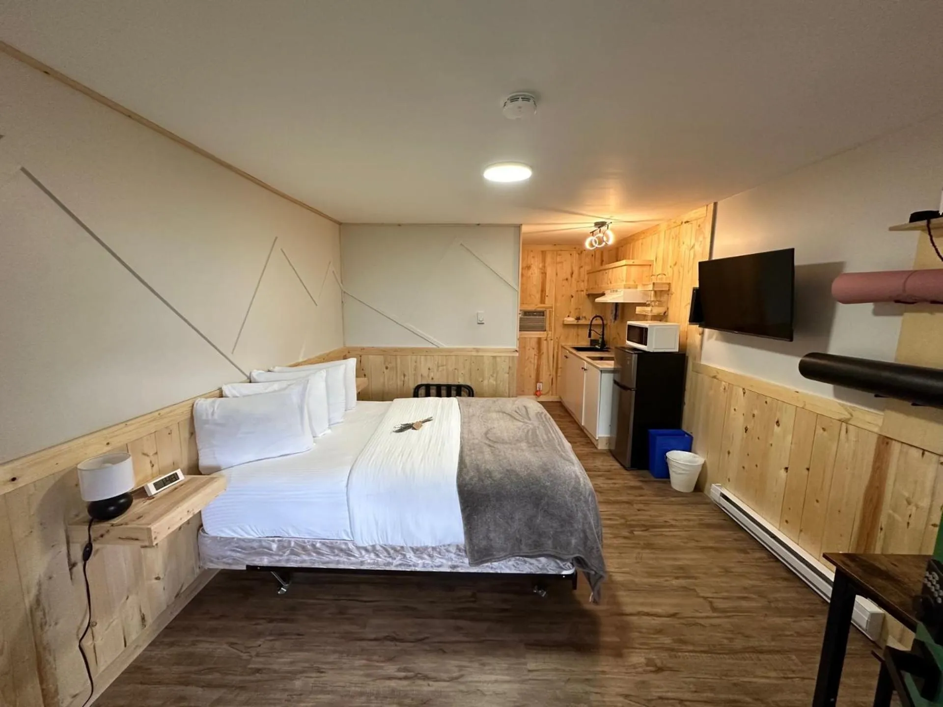 Bed in The Valley View Cabins and Event Center