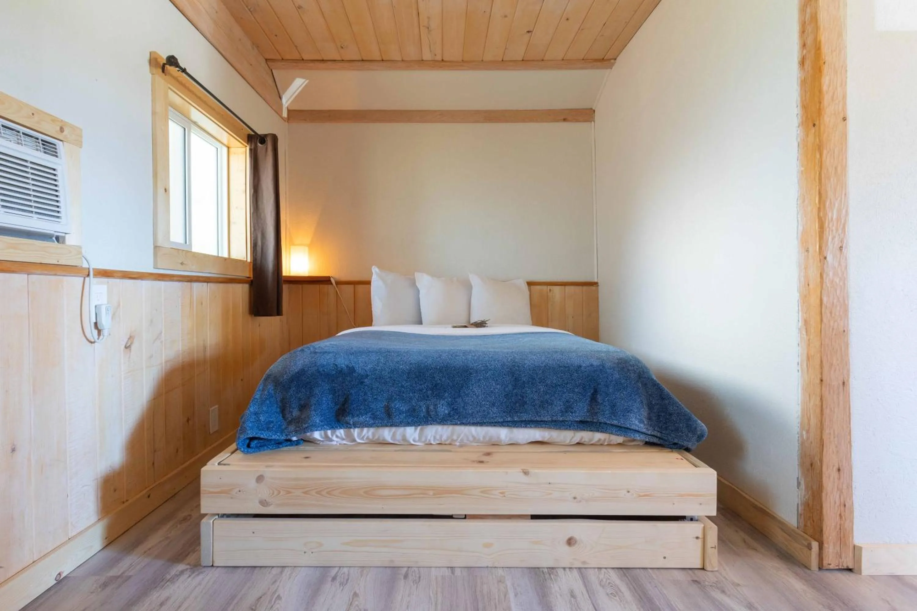 Bed in The Valley View Cabins and Event Center