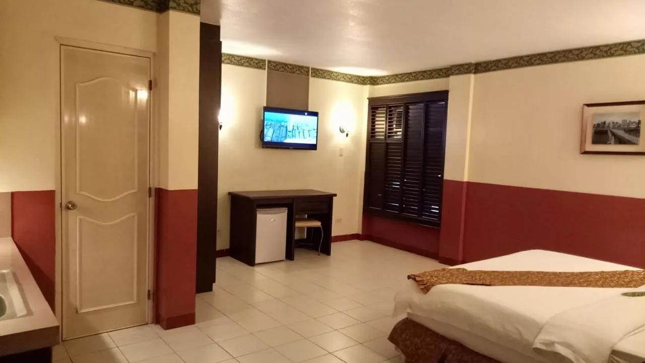 Bedroom, Bed in DM Residente Hotel Inns & Villas