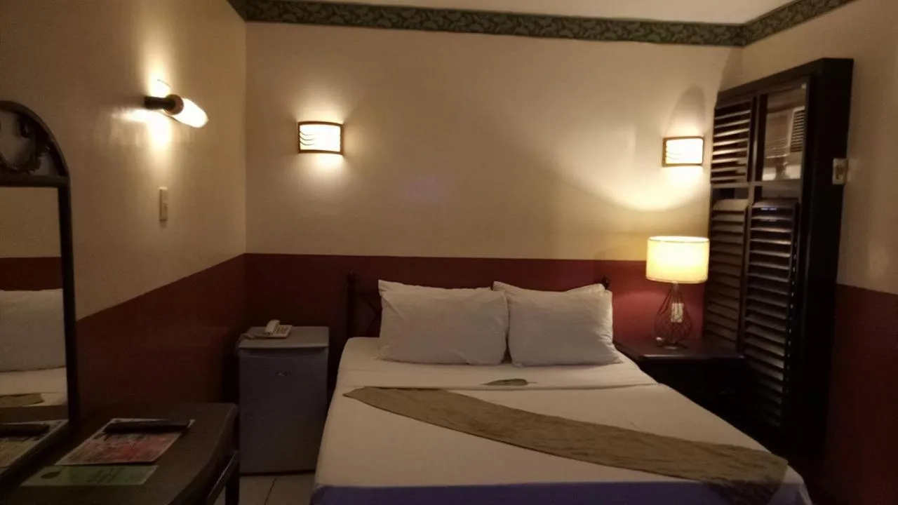 Bedroom, Bed in DM Residente Hotel Inns & Villas