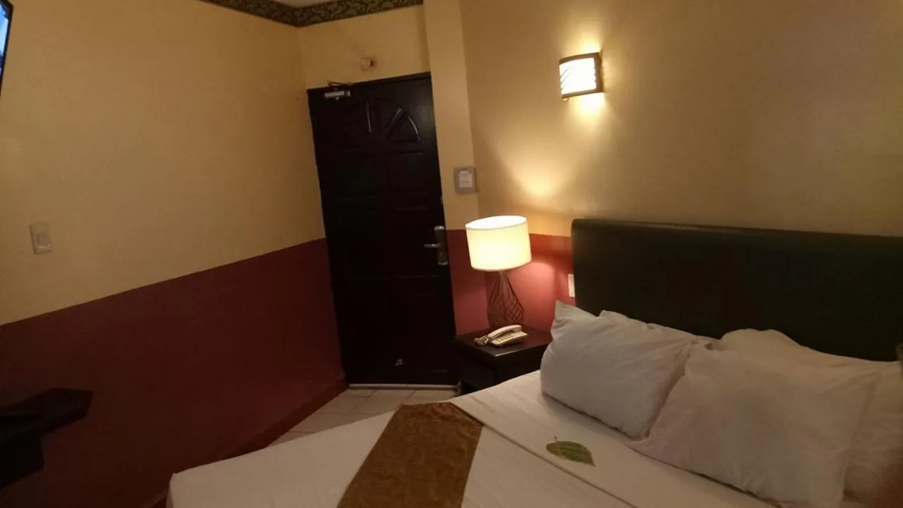 Bedroom, Bed in DM Residente Hotel Inns & Villas