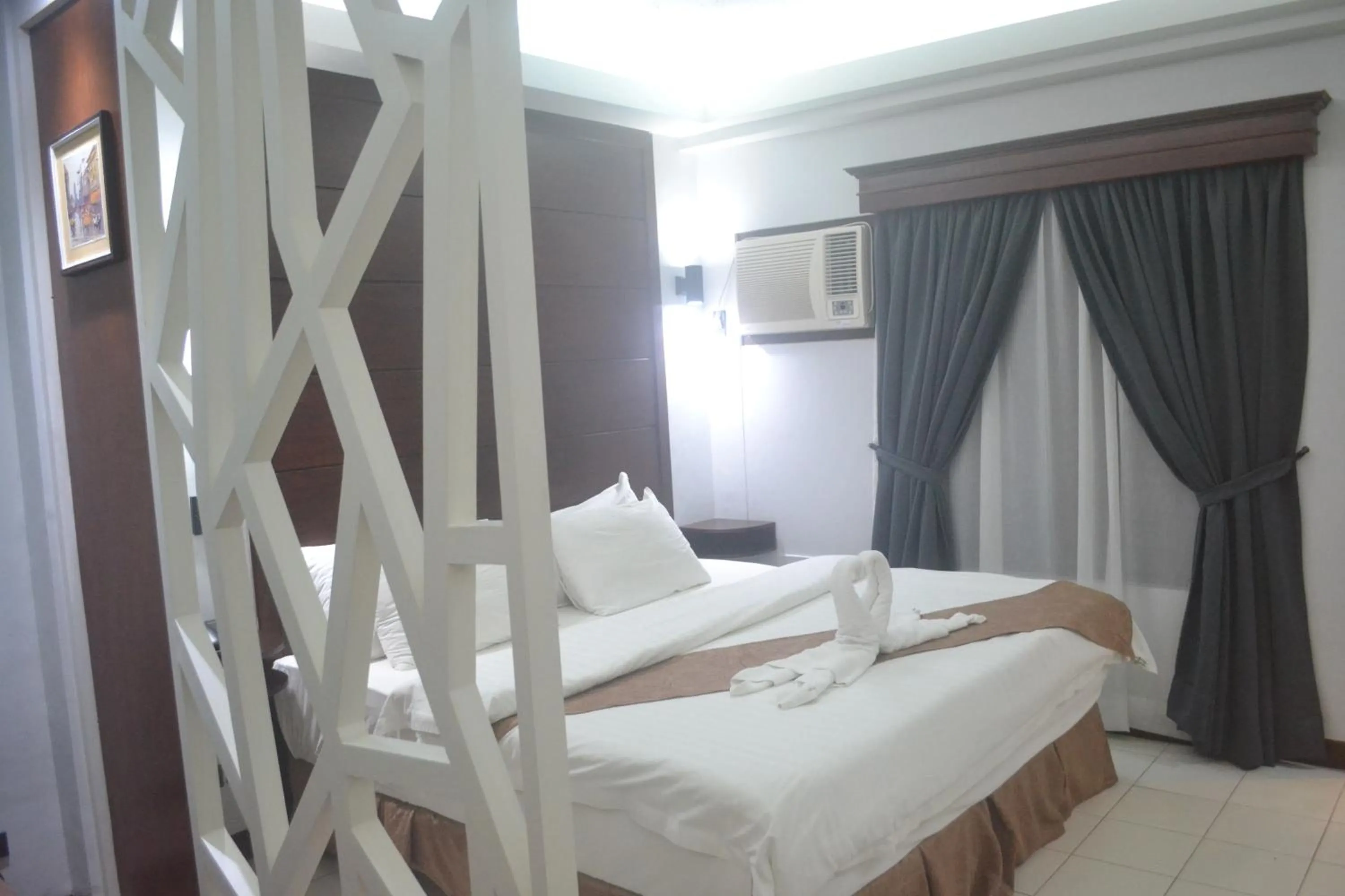 Photo of the whole room, Bed in DM Residente Hotel Inns & Villas