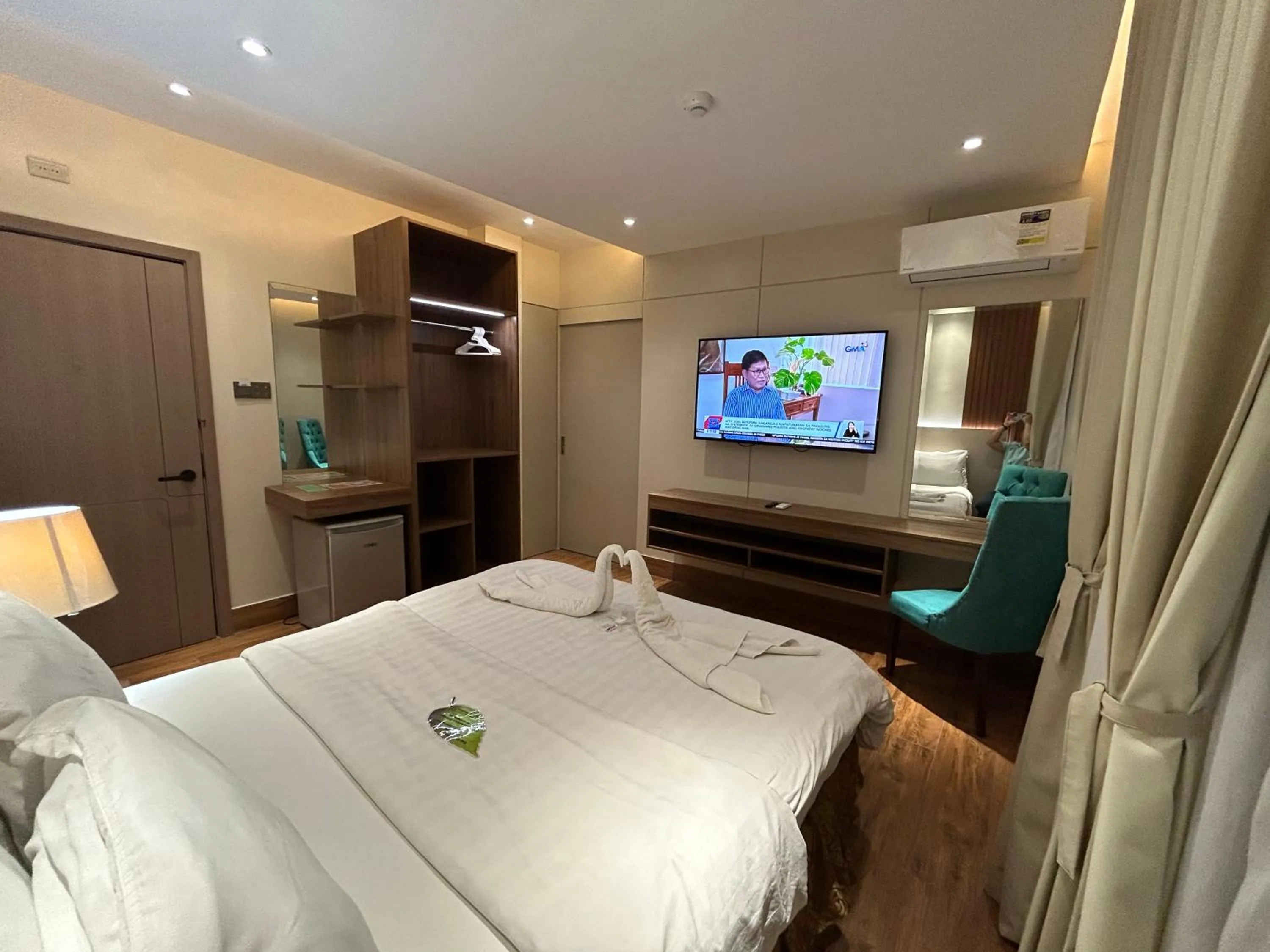 Bed in DM Residente Hotel Inns & Villas