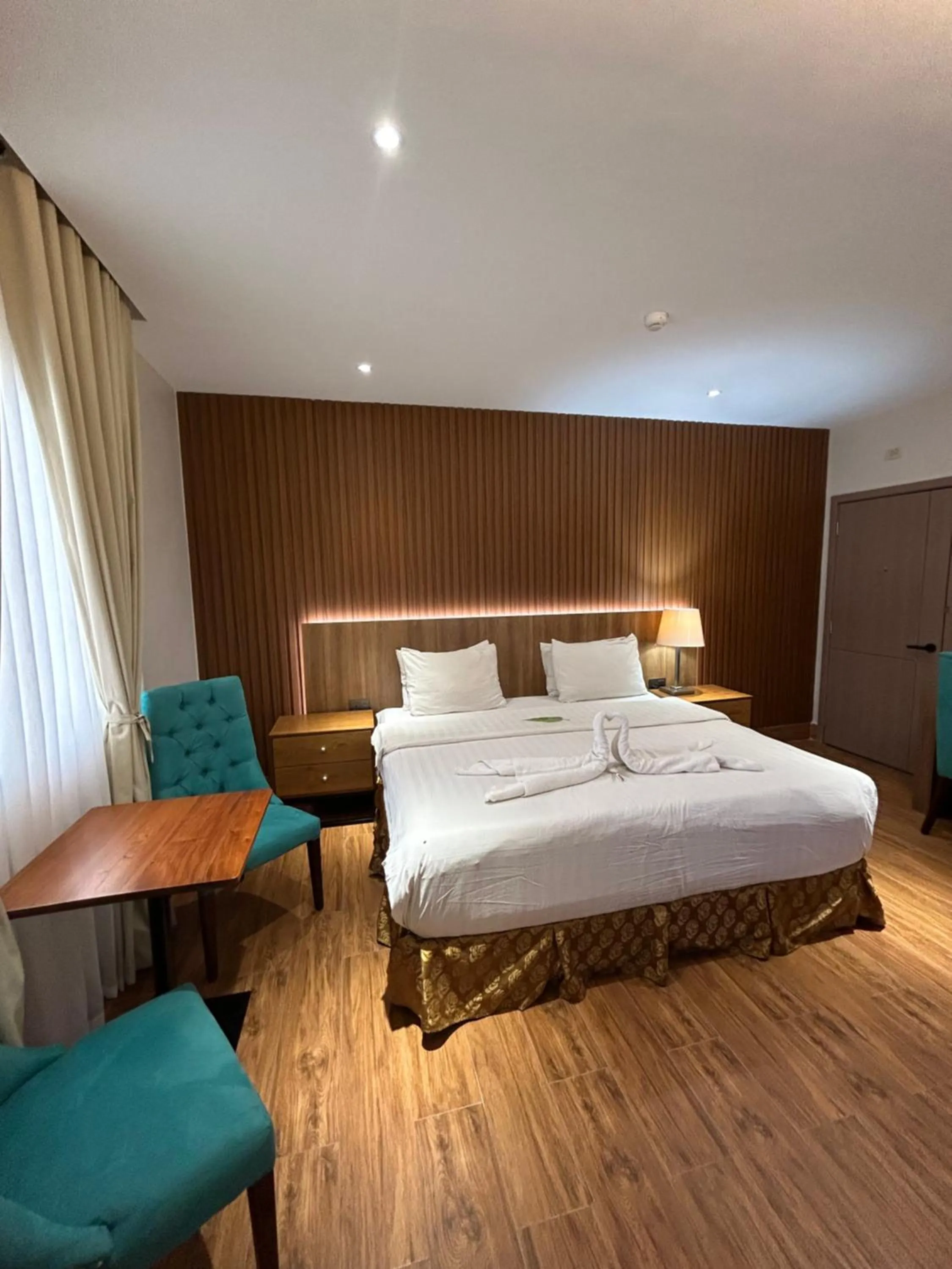 Photo of the whole room, Bed in DM Residente Hotel Inns & Villas