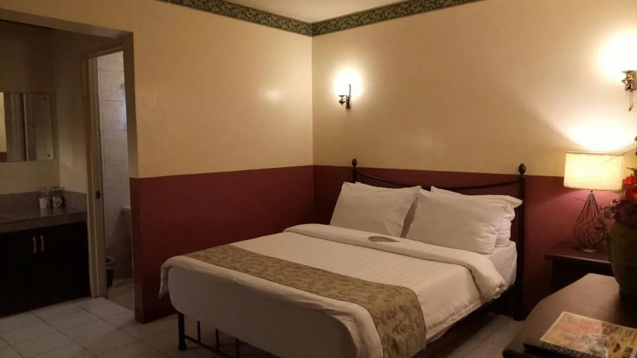 Bedroom, Bed in DM Residente Hotel Inns & Villas