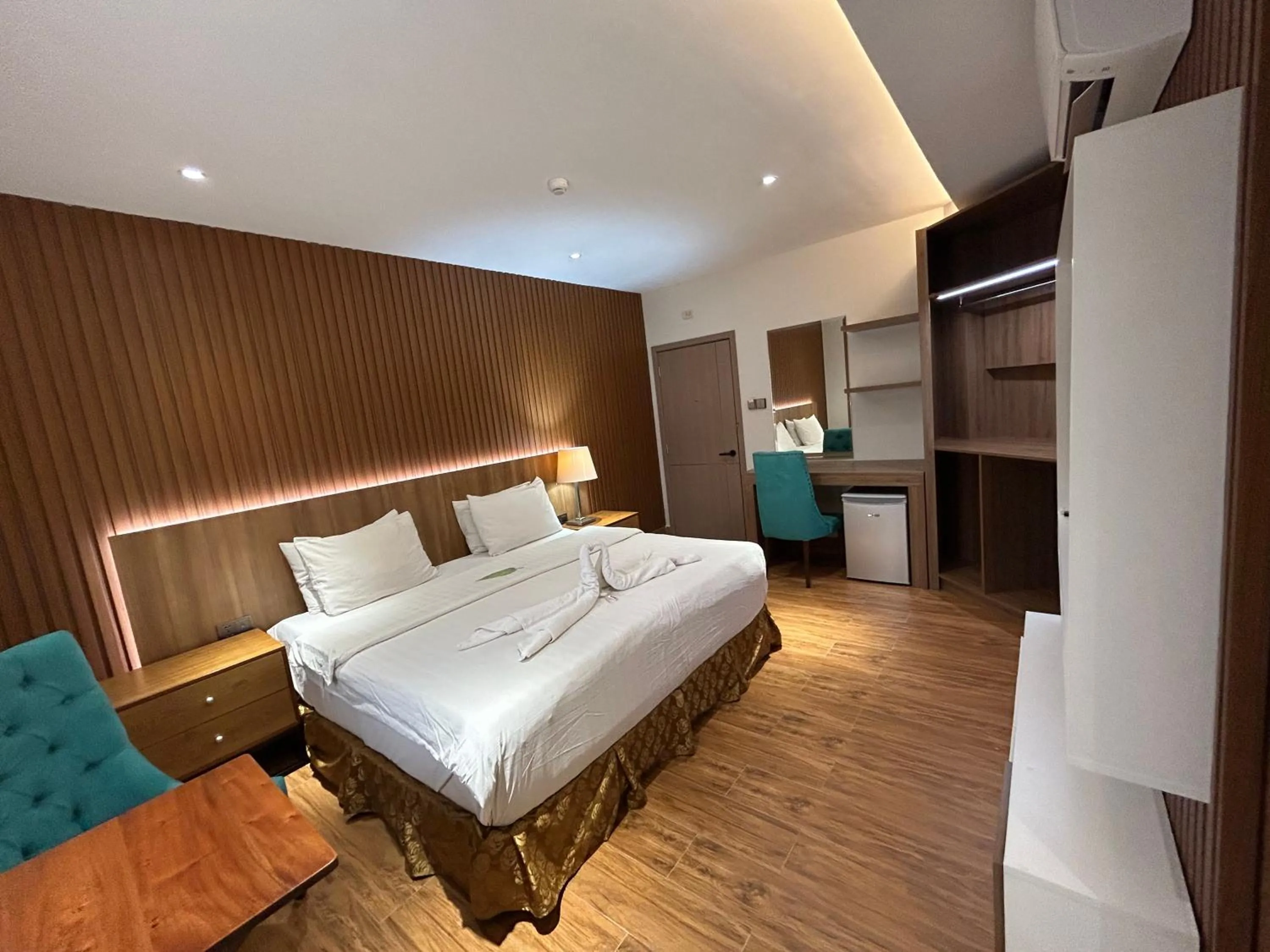 Bed in DM Residente Hotel Inns & Villas