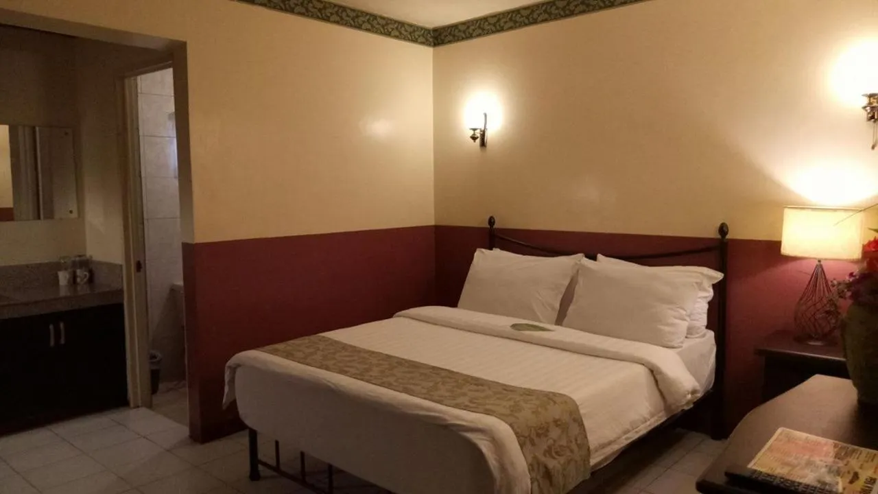 Bedroom, Bed in DM Residente Hotel Inns & Villas