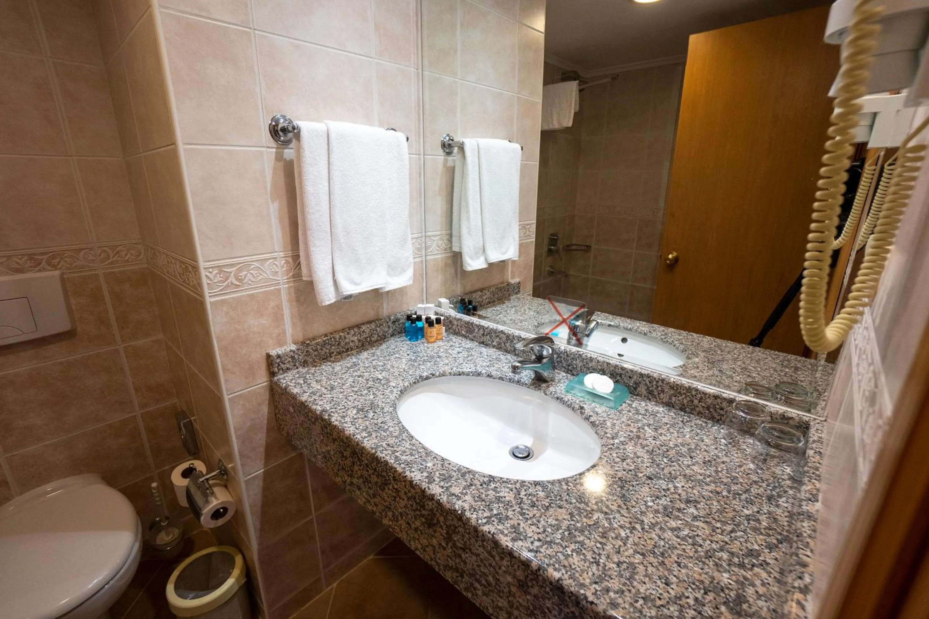 Bathroom in Presa Di Finica Hotel