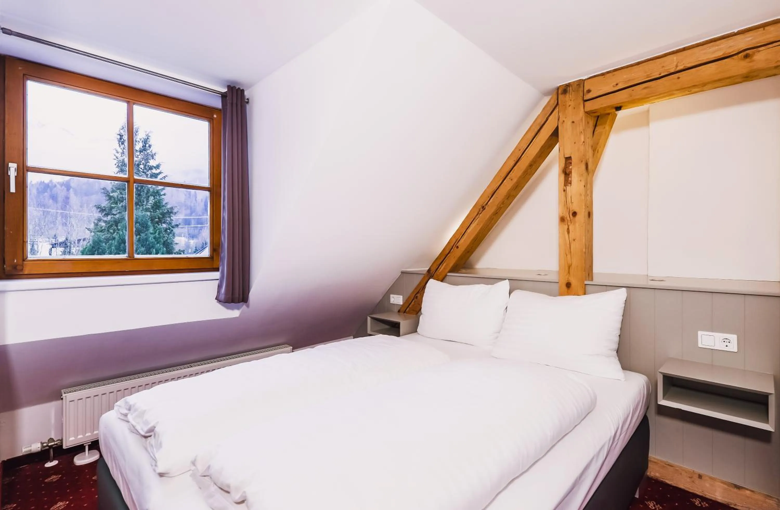 Bed in Kitz Residenz by Alpin Rentals
