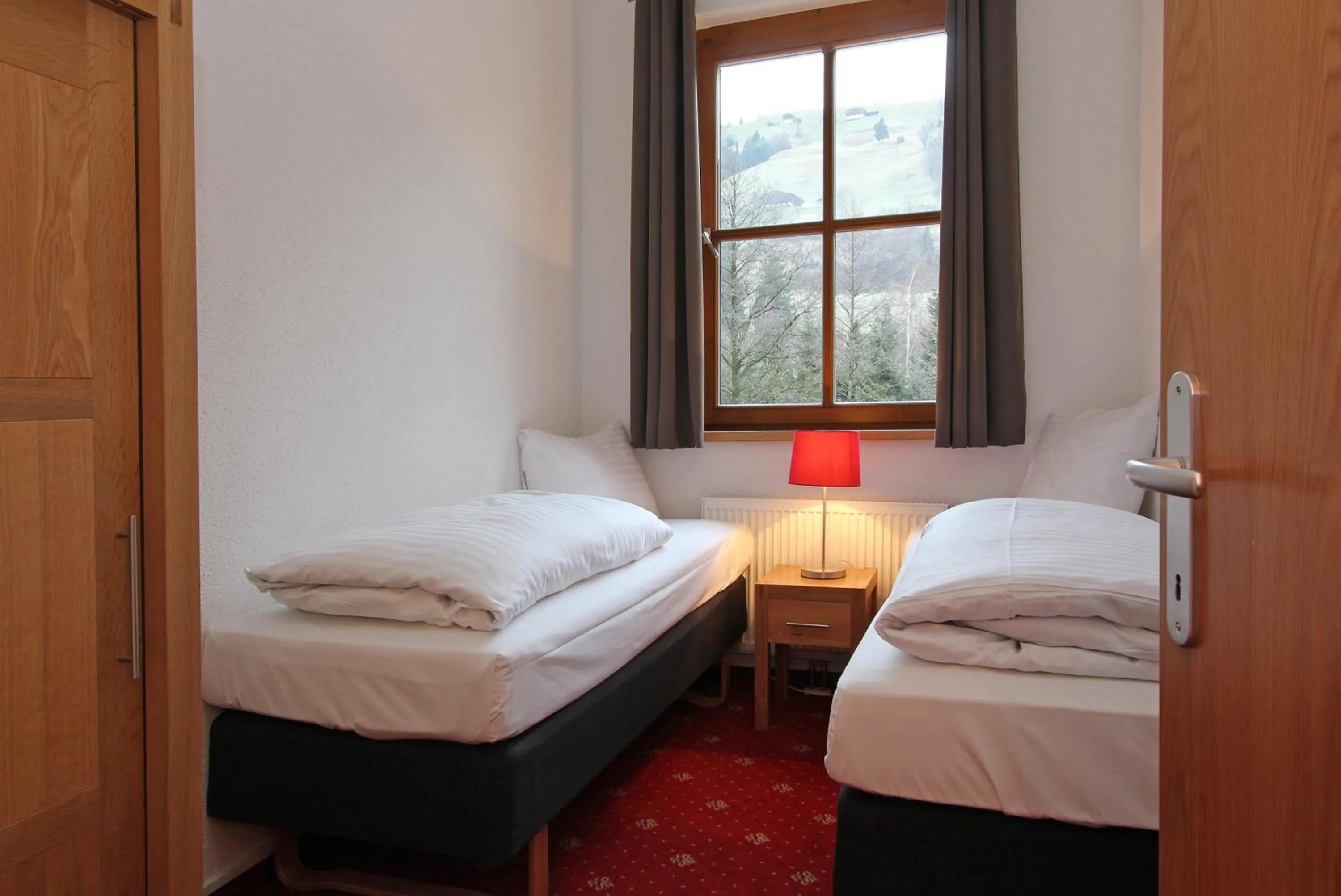 Bed in Kitz Residenz by Alpin Rentals
