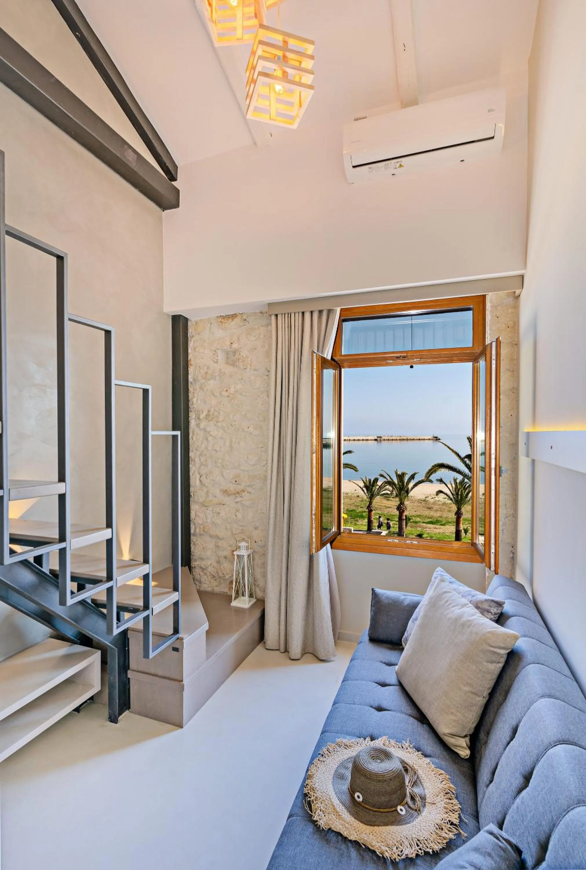 Living room, Bed in Mitos-Suites