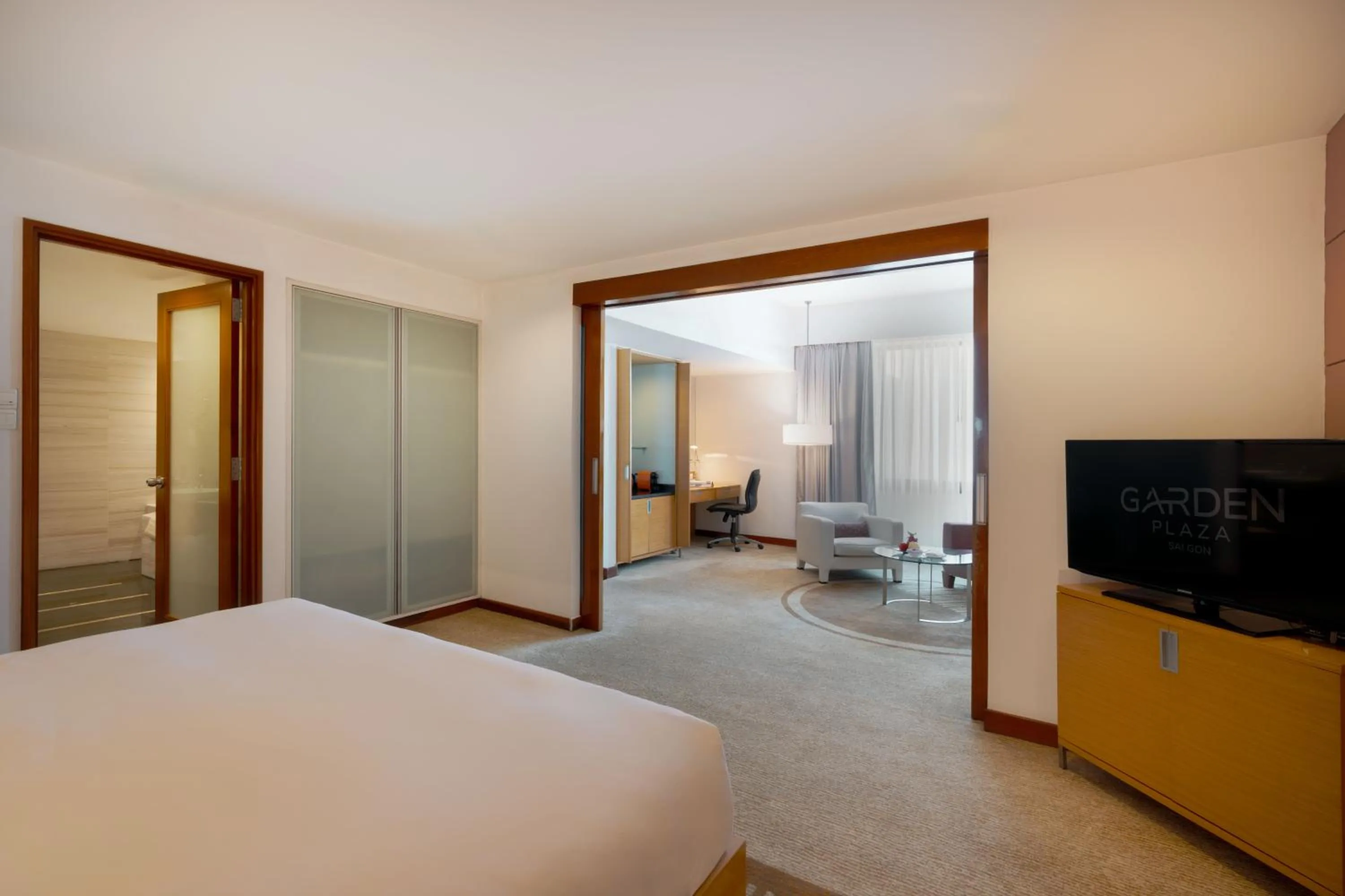 Photo of the whole room, Bed in Garden Plaza Saigon - Formerly PARKROYAL Saigon