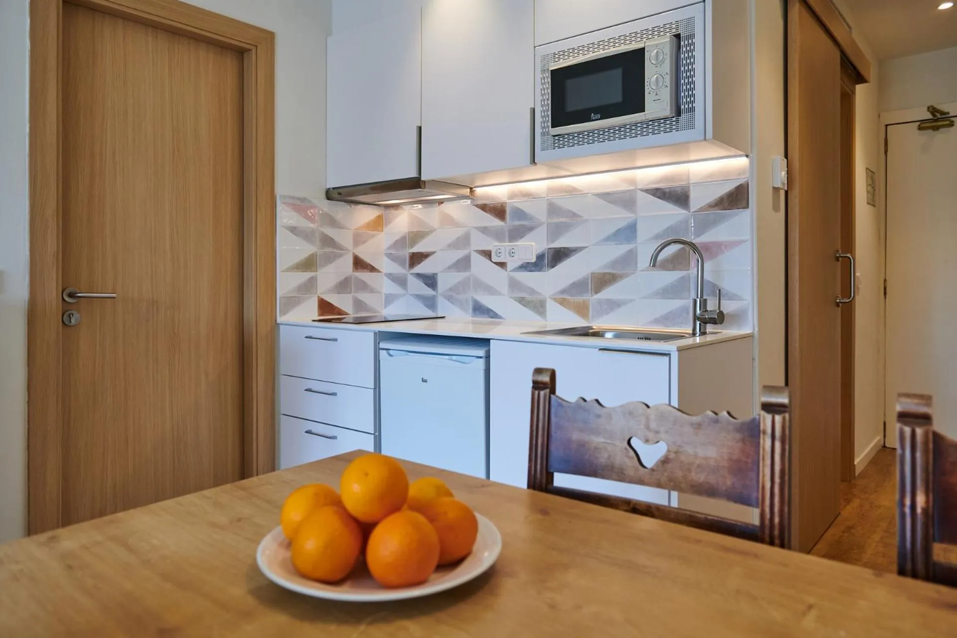 Kitchen or kitchenette in Hotel Apartamentos Cala Santanyi