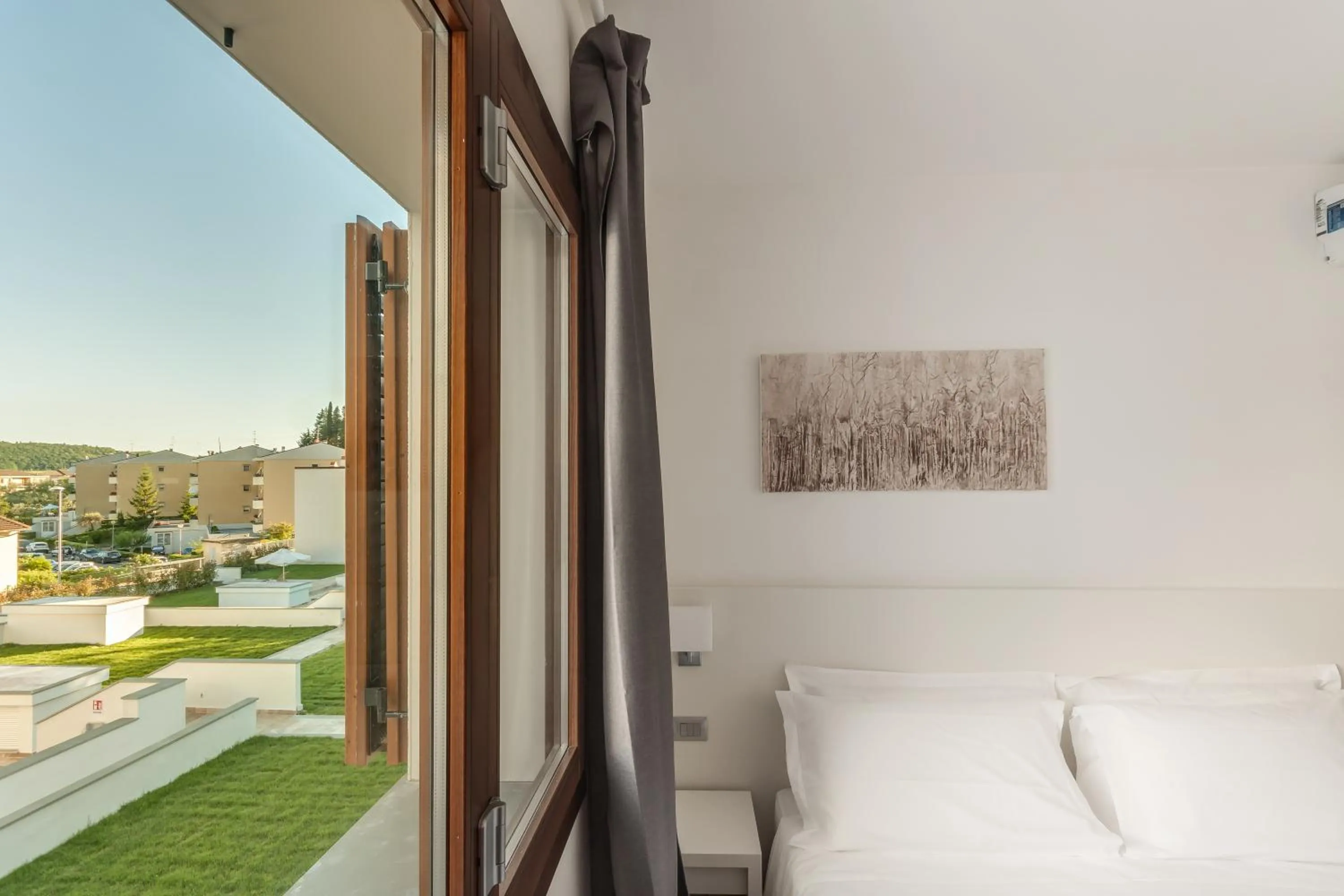 Bed in The Florence Hills Resort & Wellness