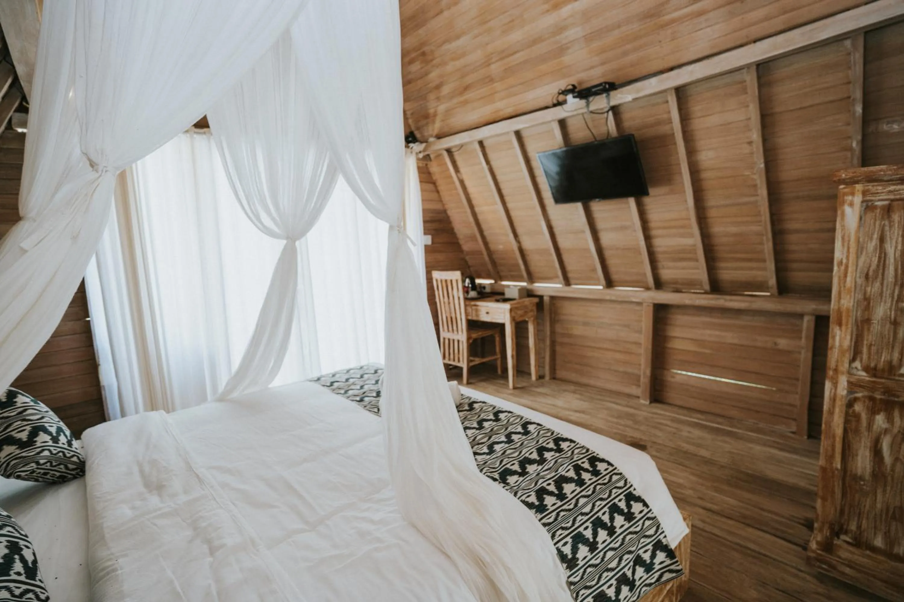 Communal lounge/ TV room, Bed in Permata Hill Nusa Penida