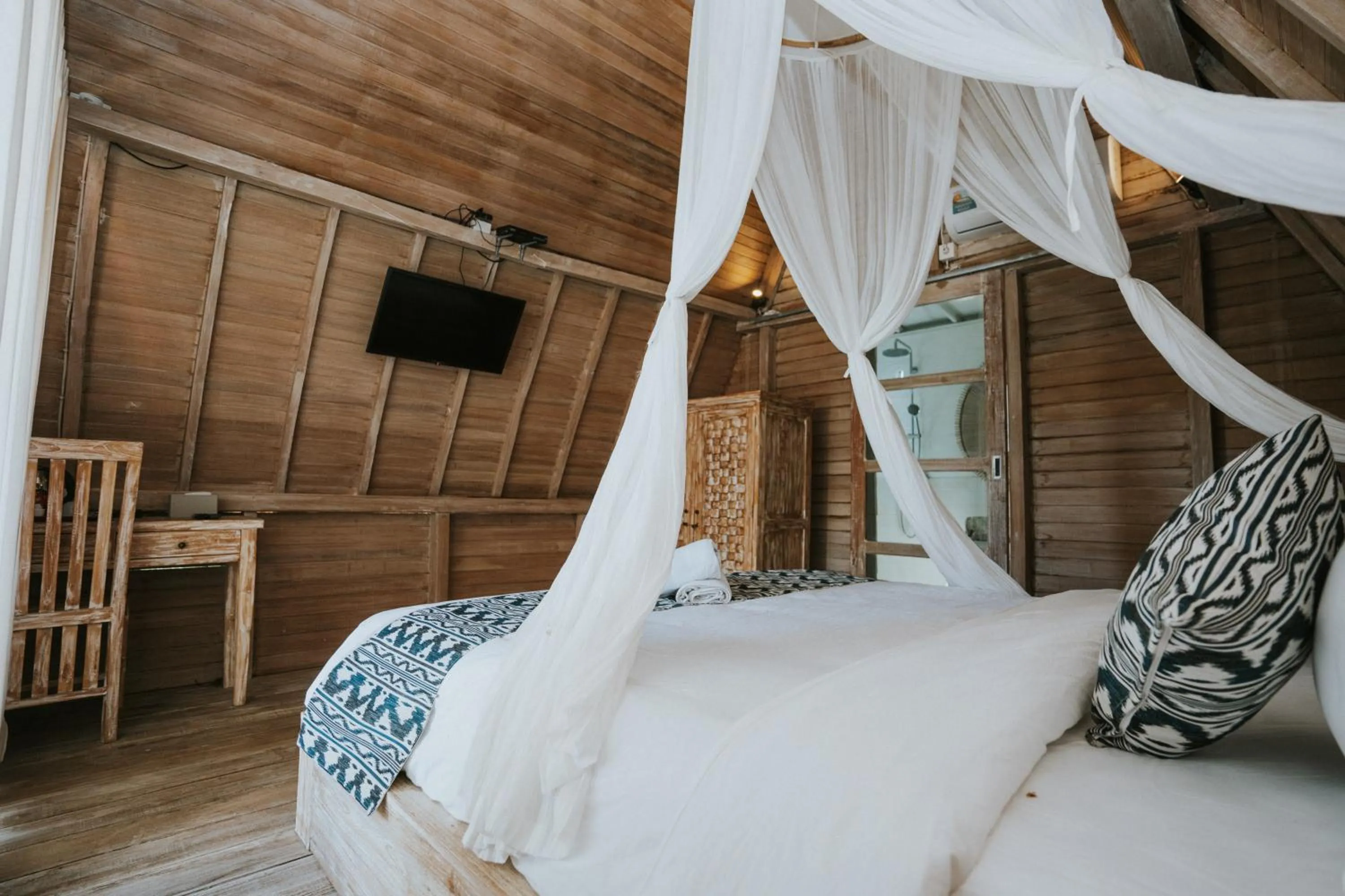 Communal lounge/ TV room, Bed in Permata Hill Nusa Penida