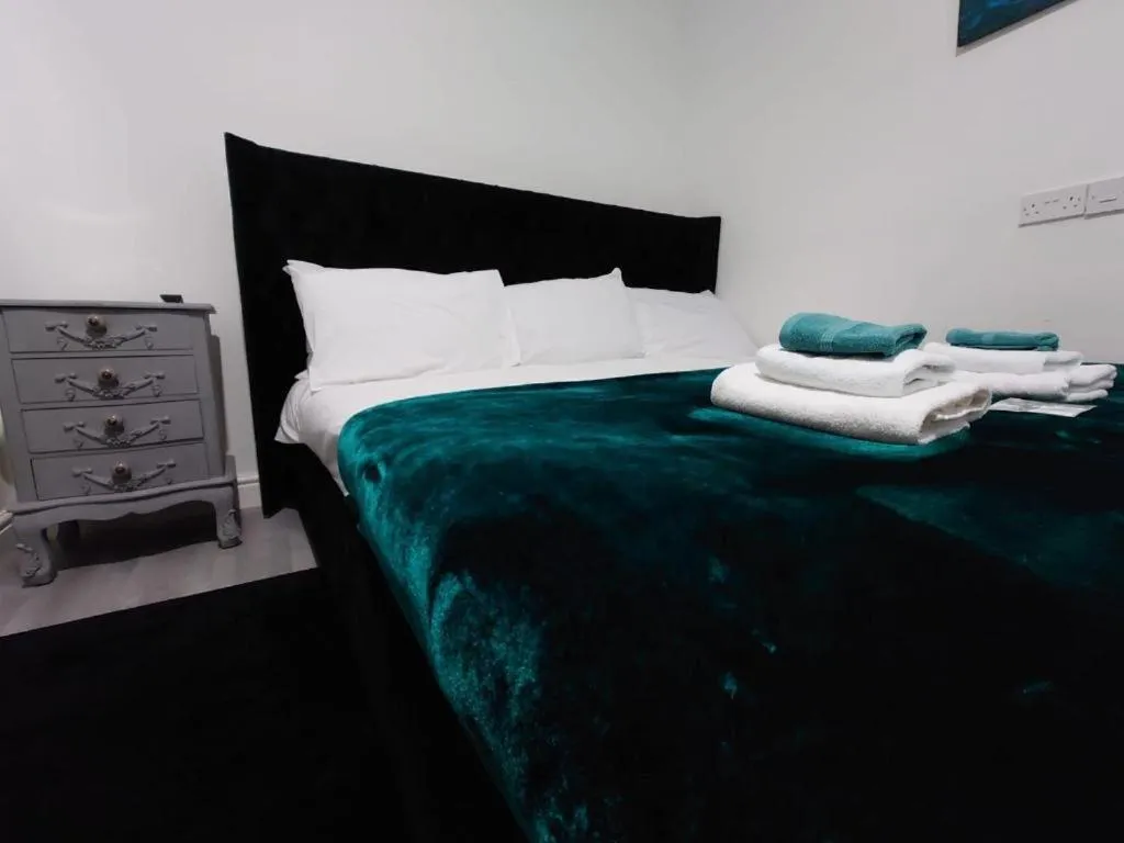 Bedroom, Bed in High Tide Hotel Oyo