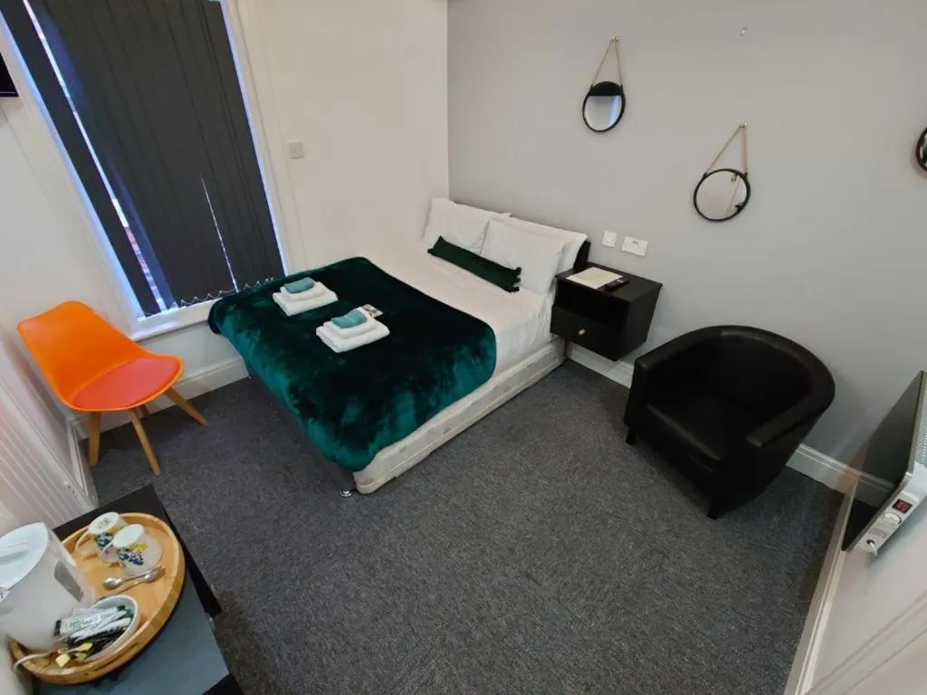 Bedroom, Bed in High Tide Hotel Oyo