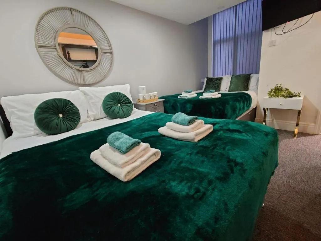 Bedroom in High Tide Hotel Oyo