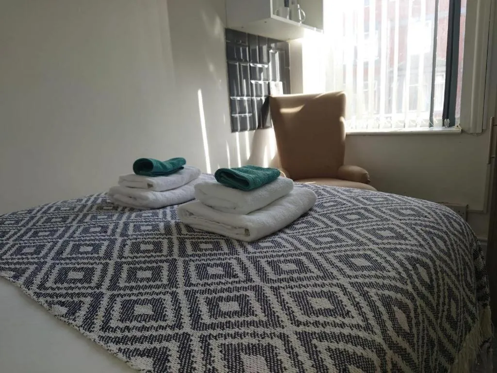 Bedroom, Bed in High Tide Hotel Oyo