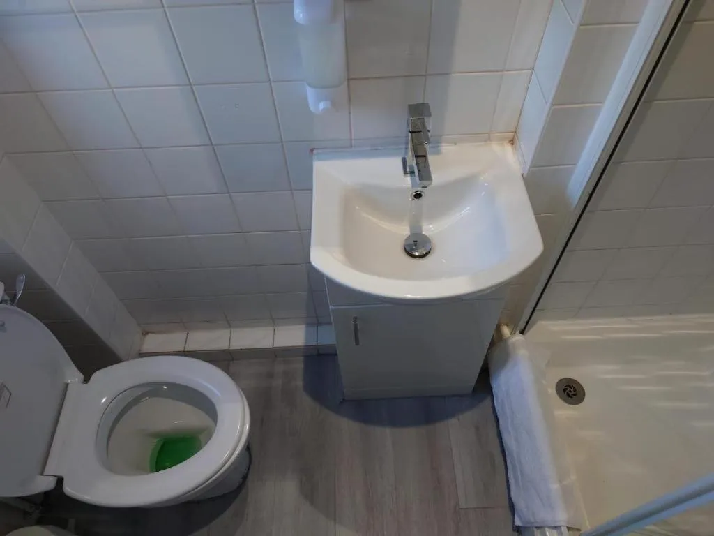 Bathroom in High Tide Hotel Oyo