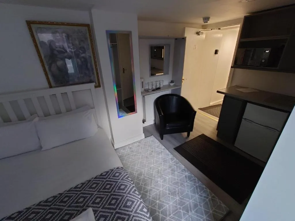 Bedroom, Bed in High Tide Hotel Oyo