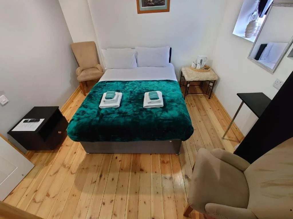 Bedroom, Bed in High Tide Hotel Oyo