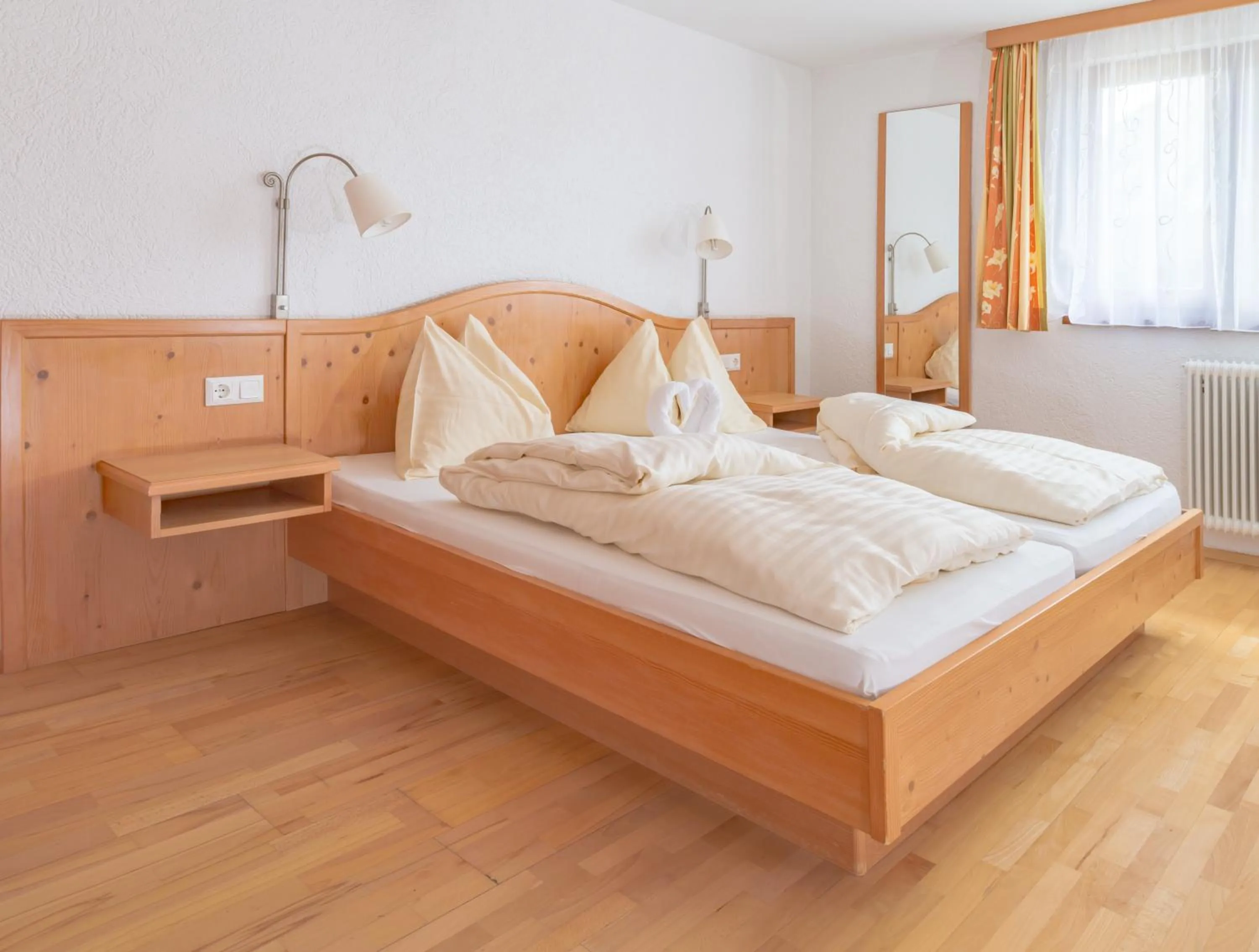 Bed in Appartements-Restaurant Schwaiger