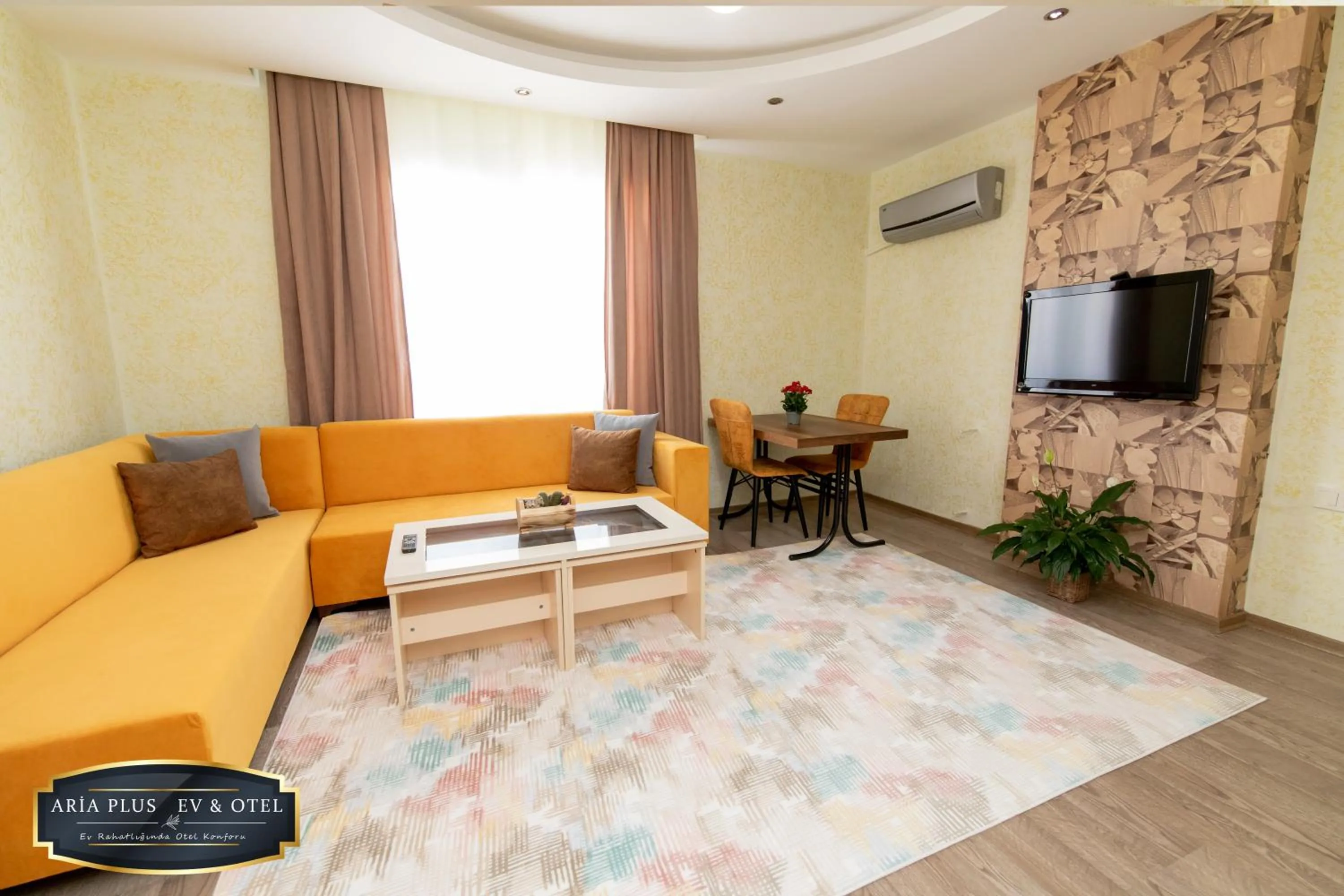 Living room in aria plus ev otel