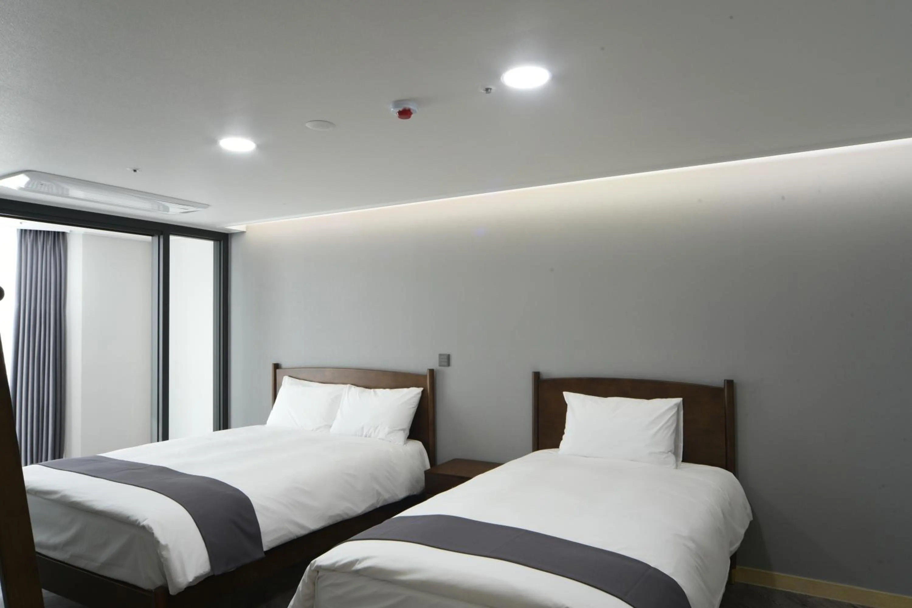 Bed in Haeundae Central Hotel