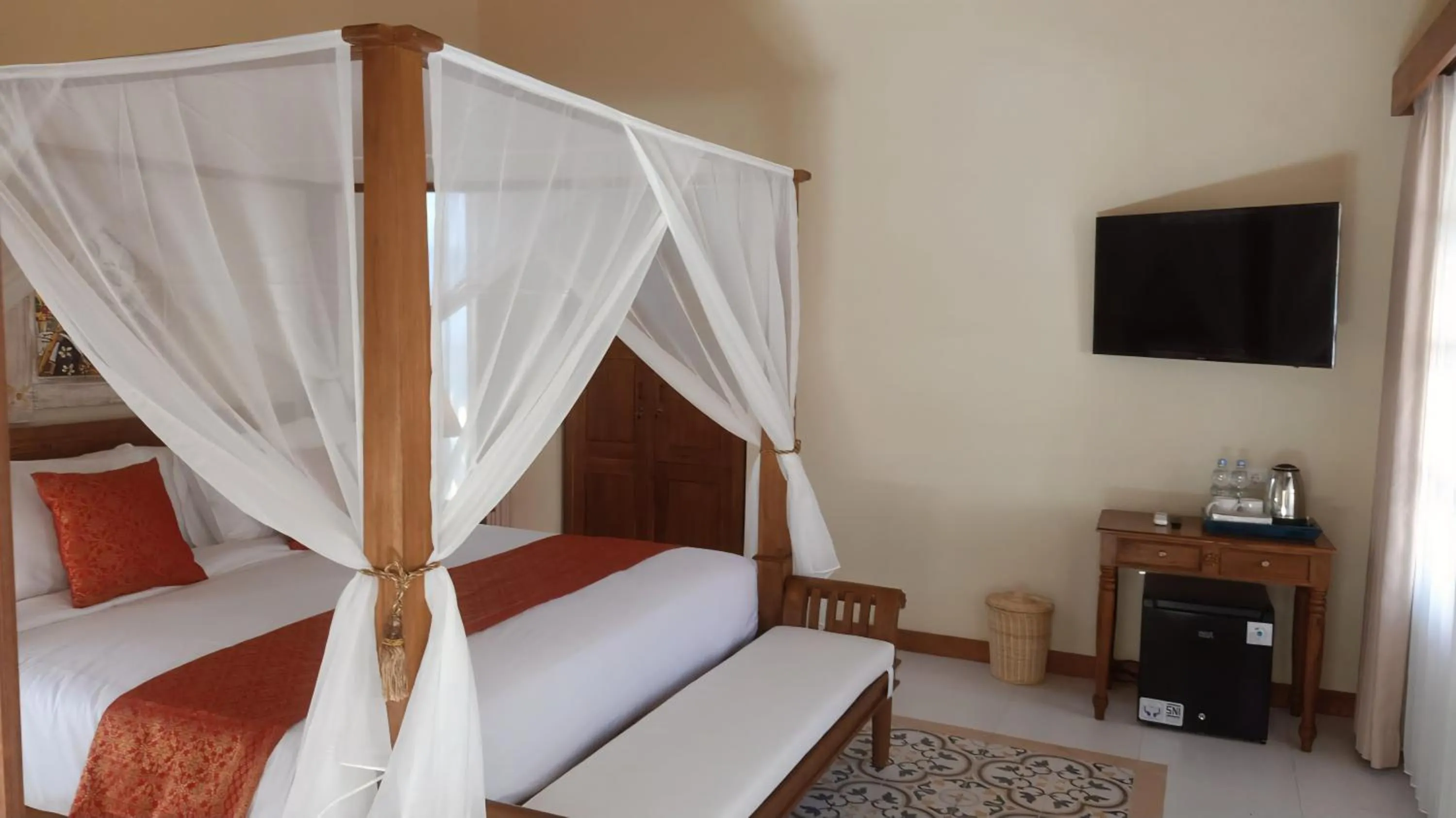 Bed in Bebek Cottages Sanur