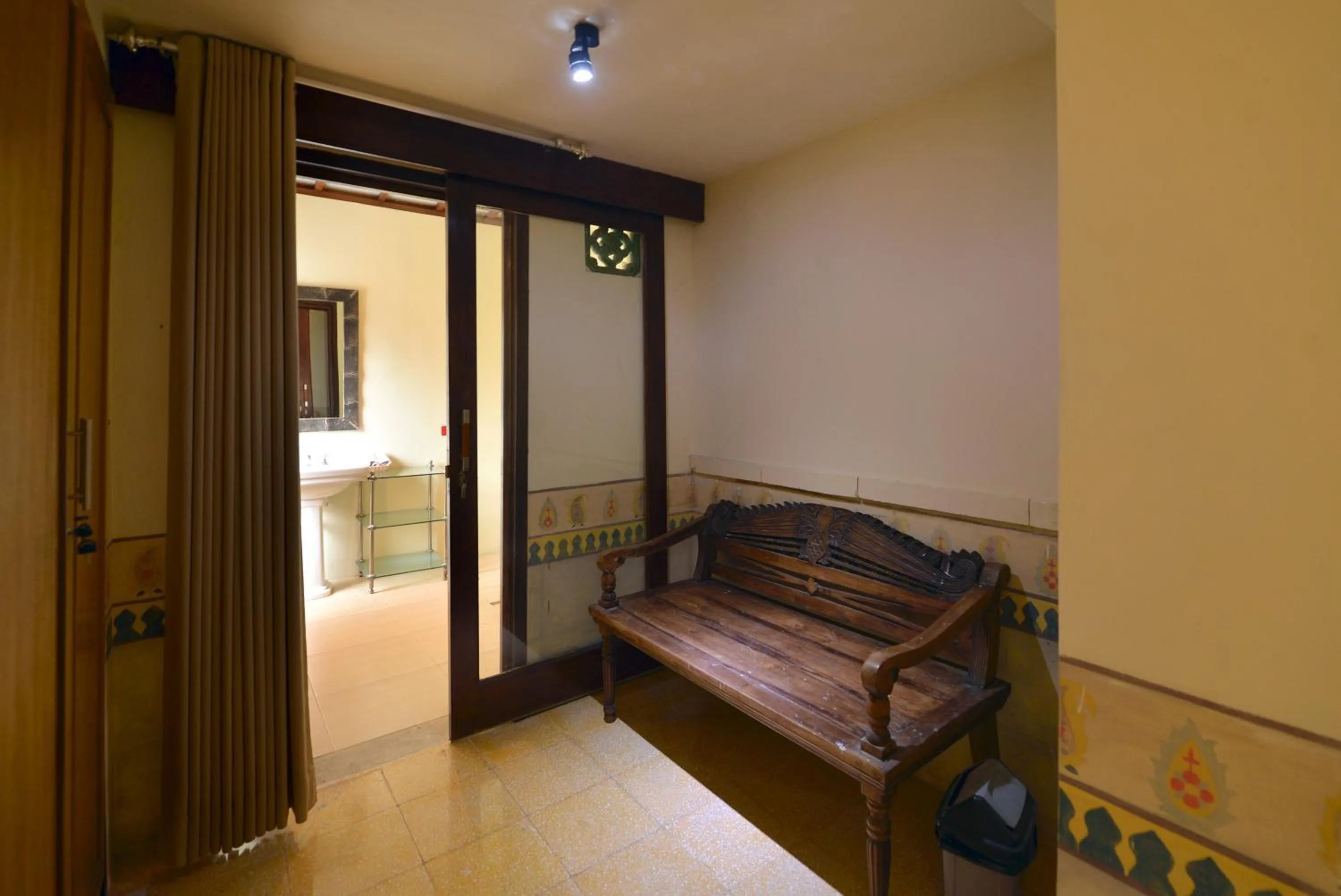 Seating area, Bed in Bebek Cottages Sanur