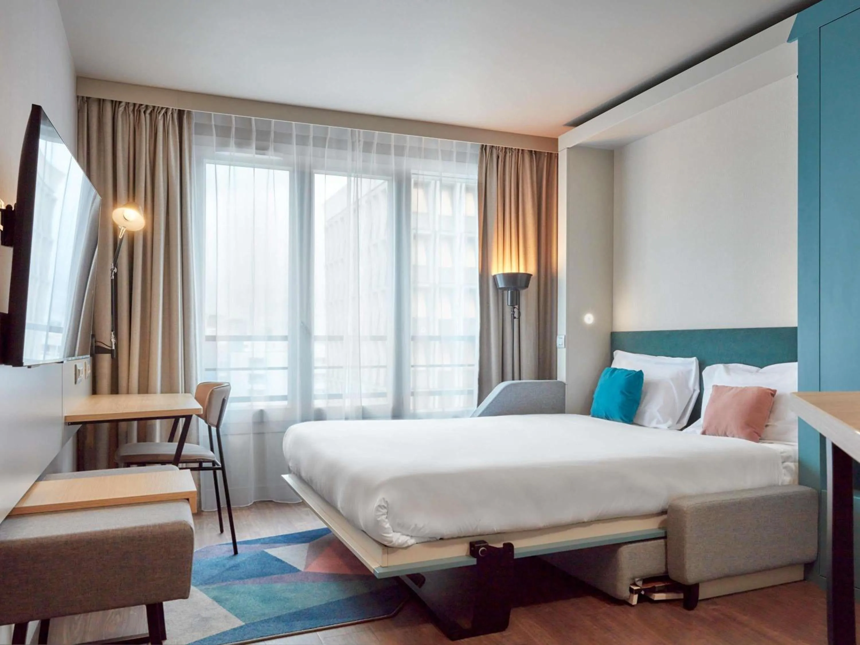 Bedroom, Bed in Aparthotel Adagio Paris Suresnes Longchamp