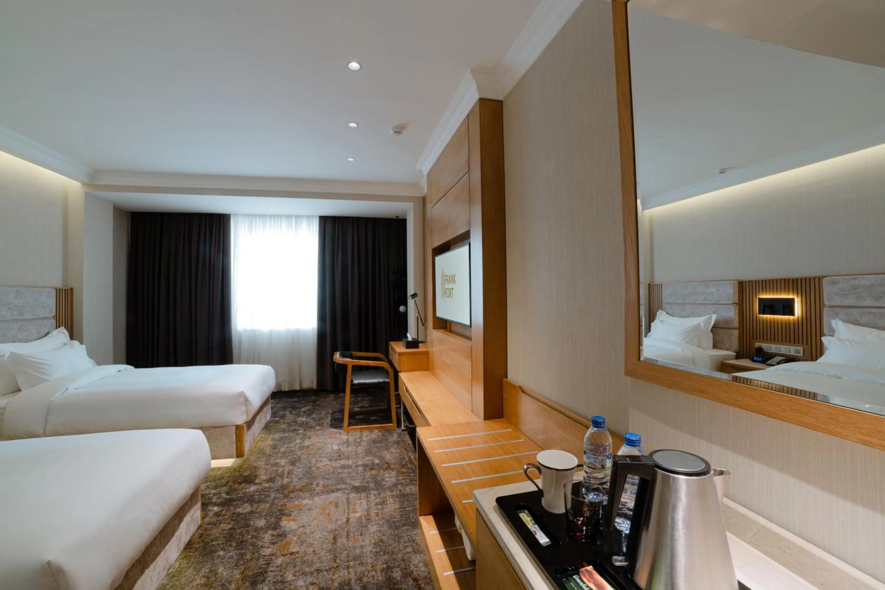 Photo of the whole room, Bed in Frankfort Hotel and Spa