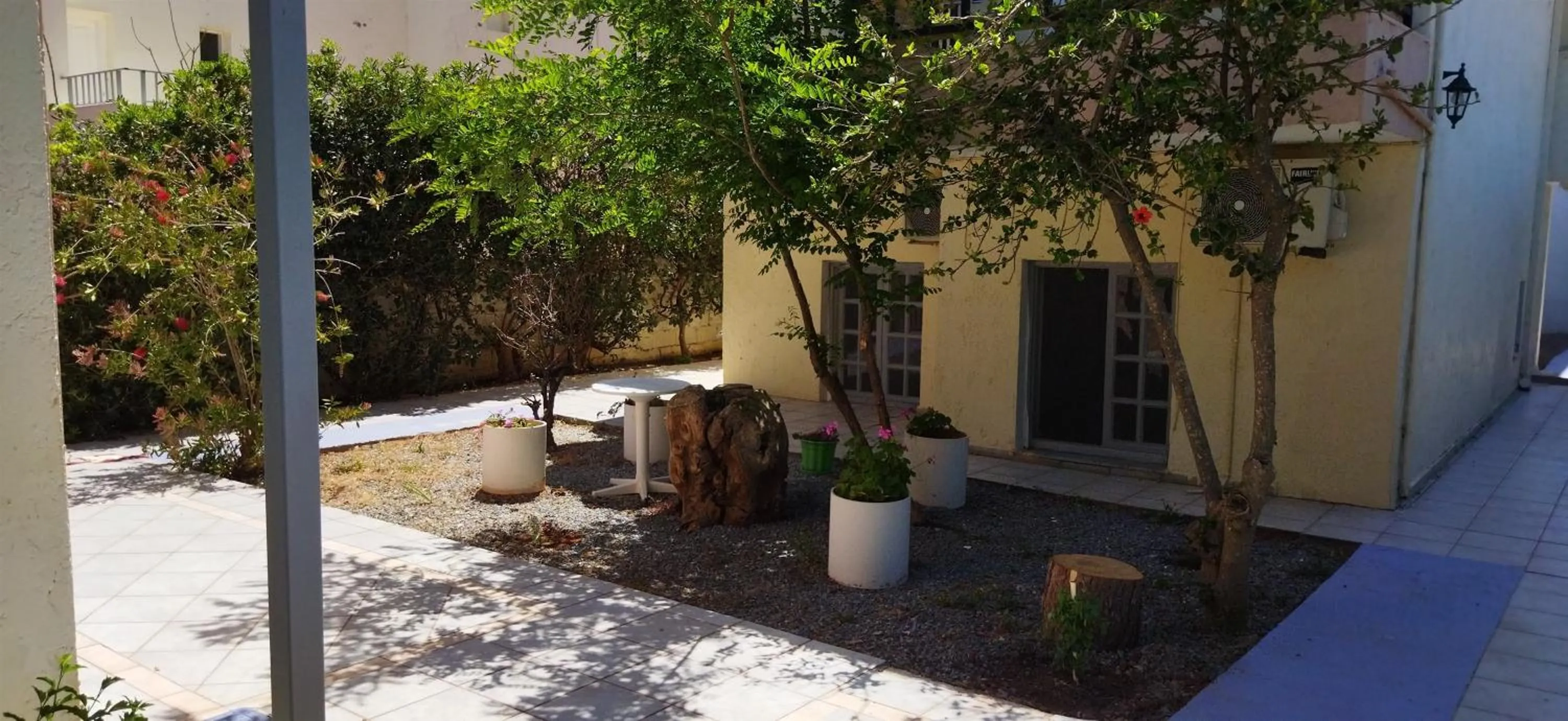 Patio in Cleo Rooms 250m from the beach