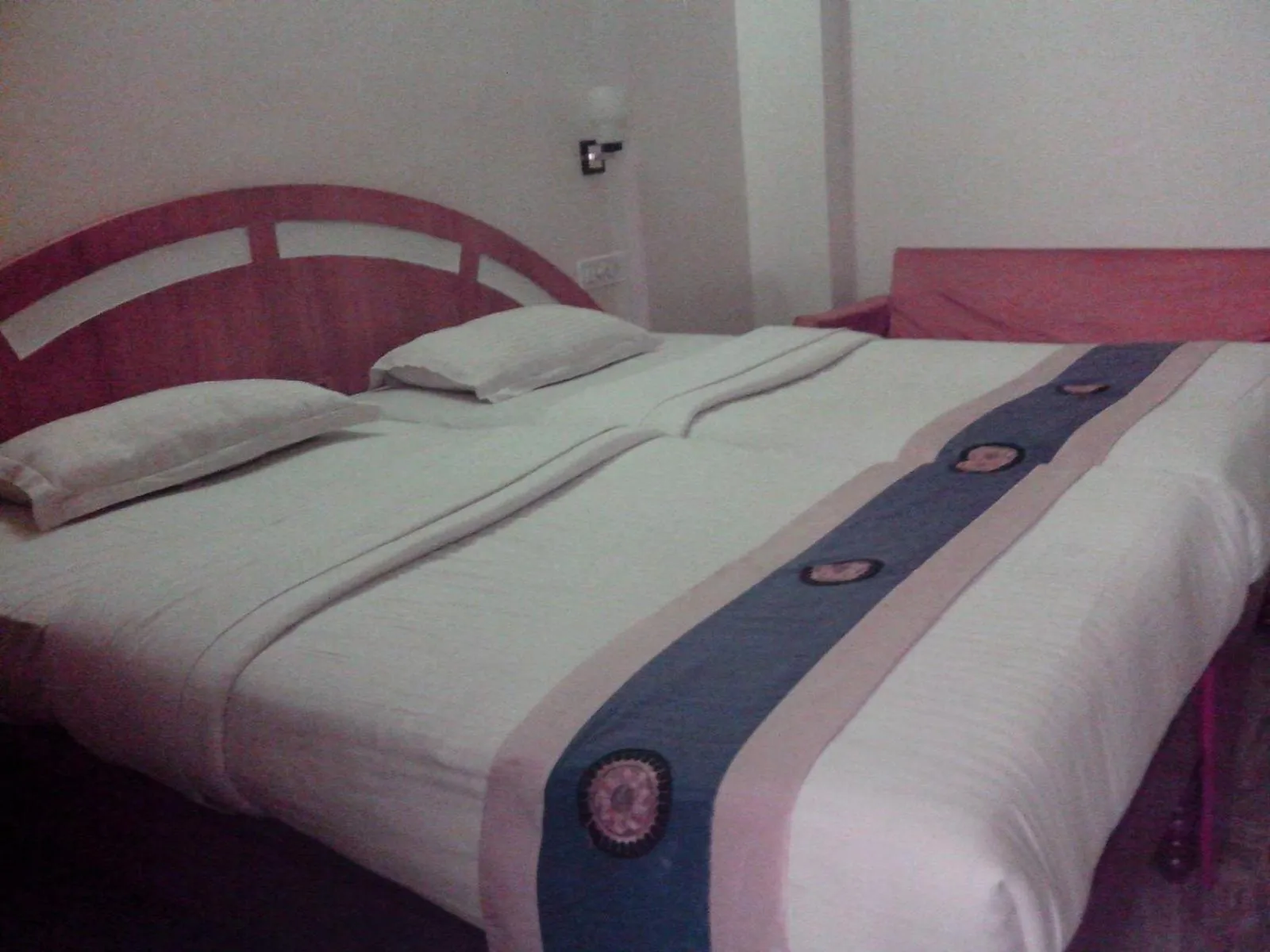 Photo of the whole room, Bed in Hotel Mahalaxmi Indo Myanmar