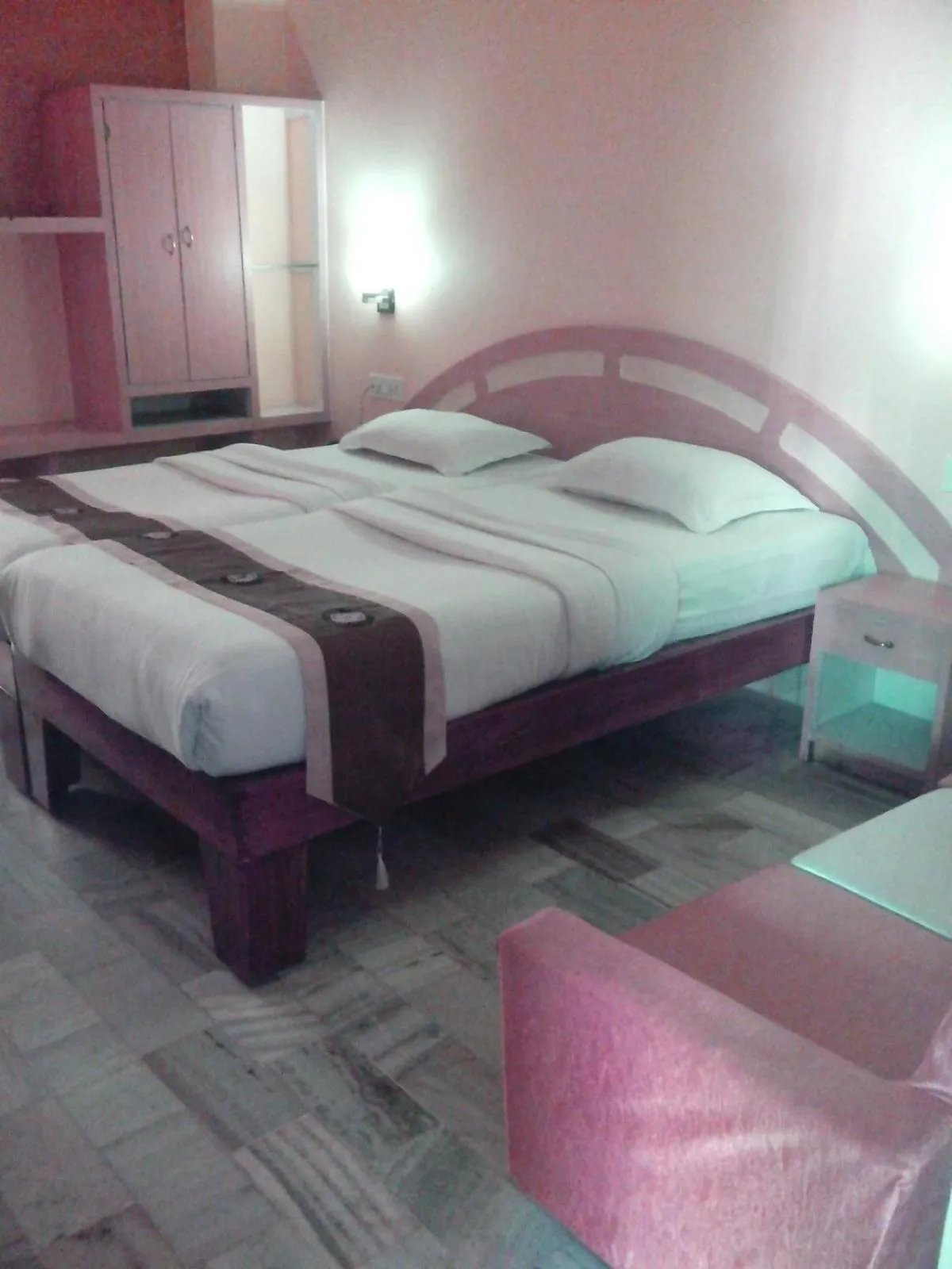 Photo of the whole room, Bed in Hotel Mahalaxmi Indo Myanmar